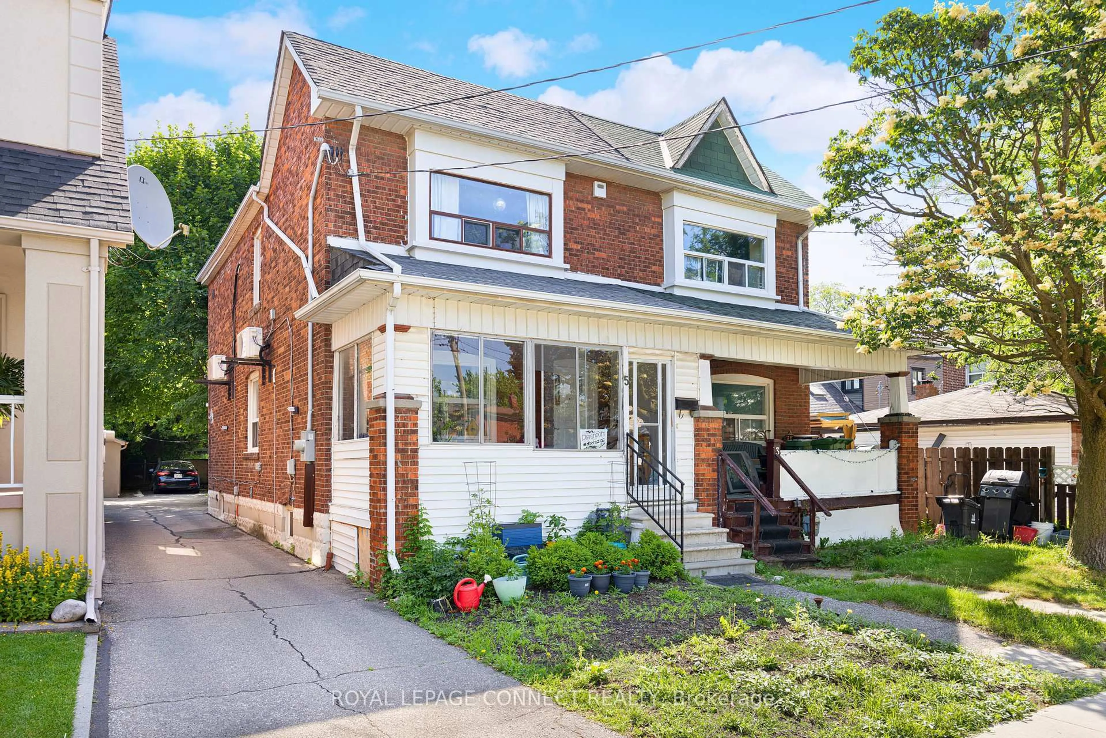 Home with brick exterior material, street for 5 Rosethorn Ave, Toronto Ontario M6N 3K7