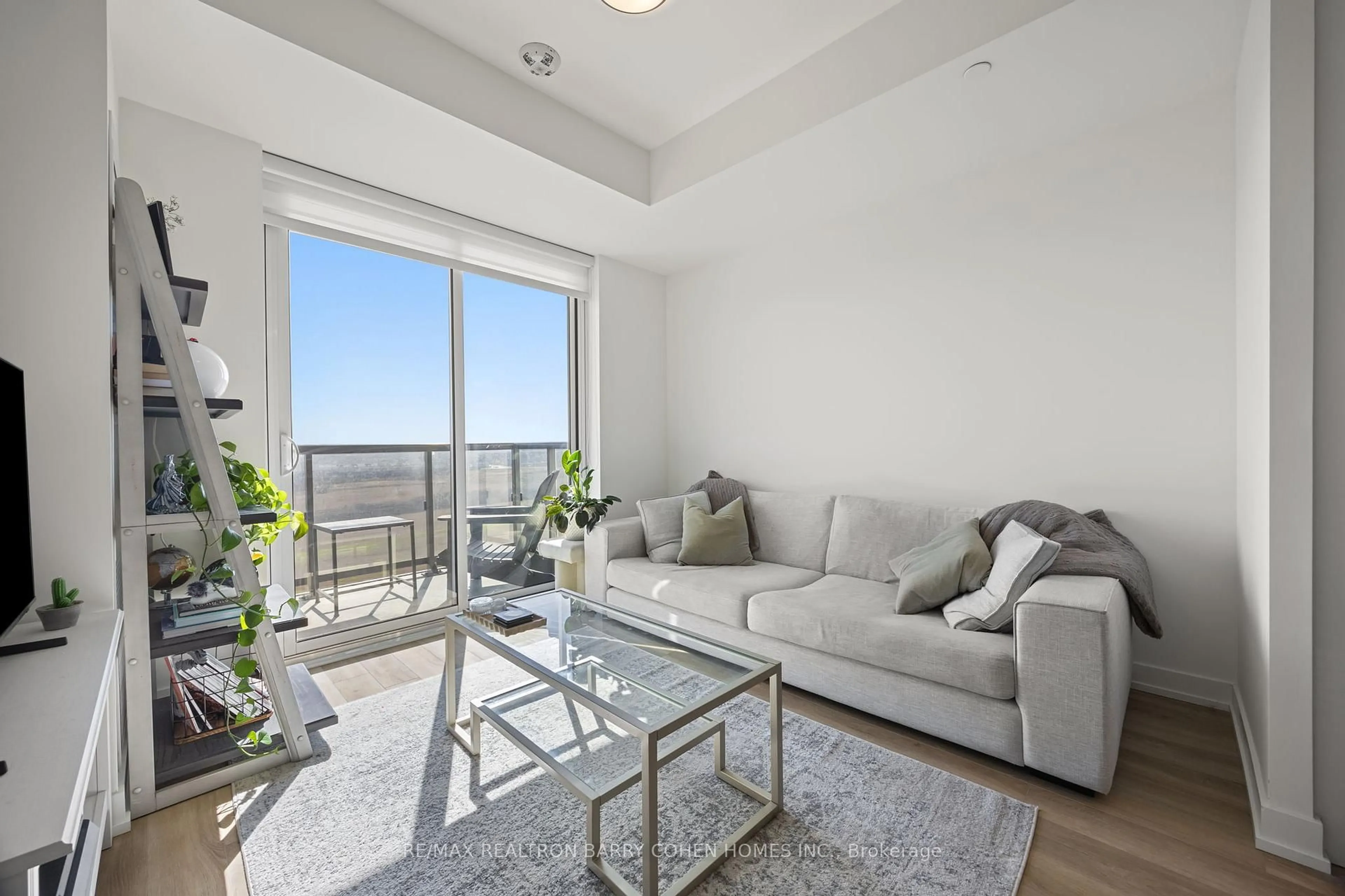Living room with furniture, unknown for 335 Wheat Boom Dr #1006, Oakville Ontario L6H 7Y1