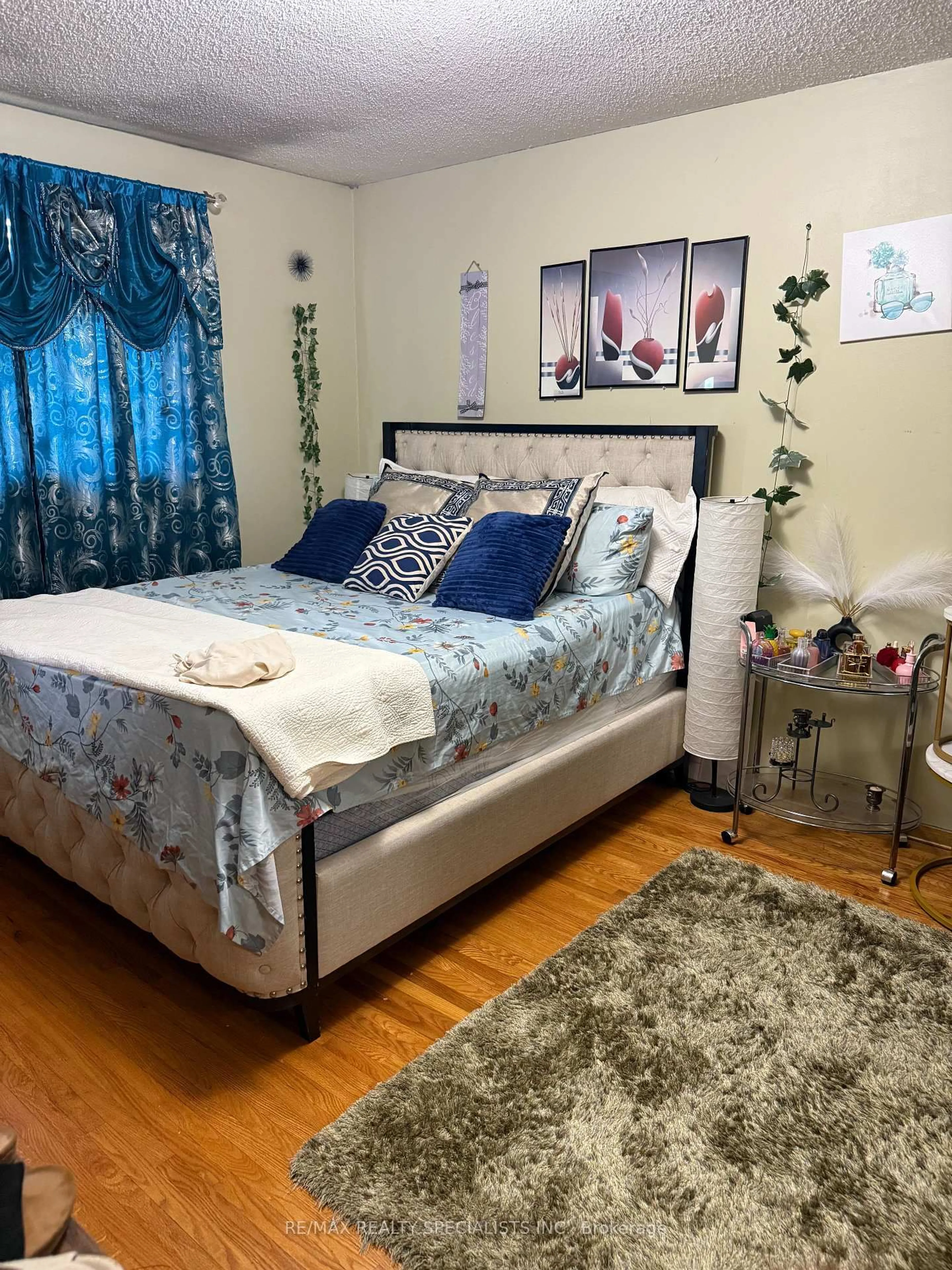 Bedroom with bed, wood/laminate floor for 42 Dantek Crt, Brampton Ontario L6V 3T4