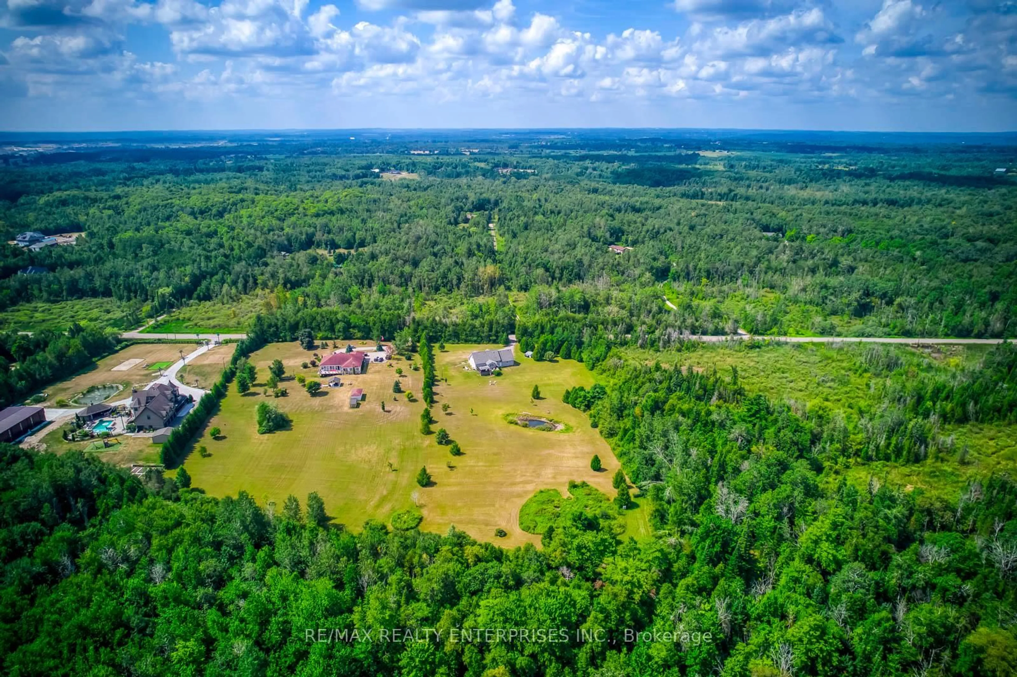 A pic from outside/outdoor area/front of a property/back of a property/a pic from drone, forest/trees view for 18681 Horseshoe Hill Rd, Caledon Ontario L7K 2B9