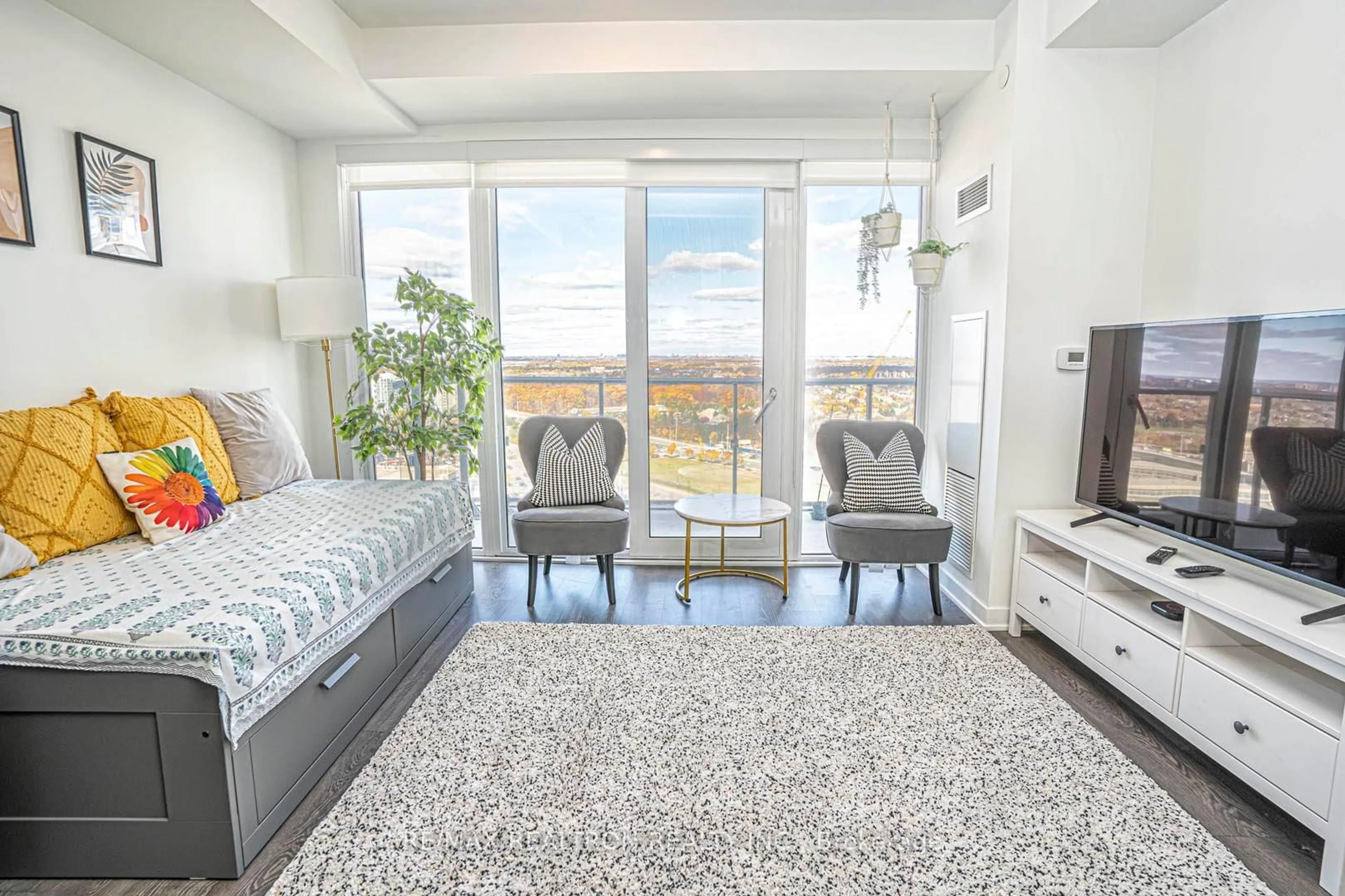 Living room with furniture, unknown for 4675 Metcalfe Ave #2003, Mississauga Ontario L5M 0Z8