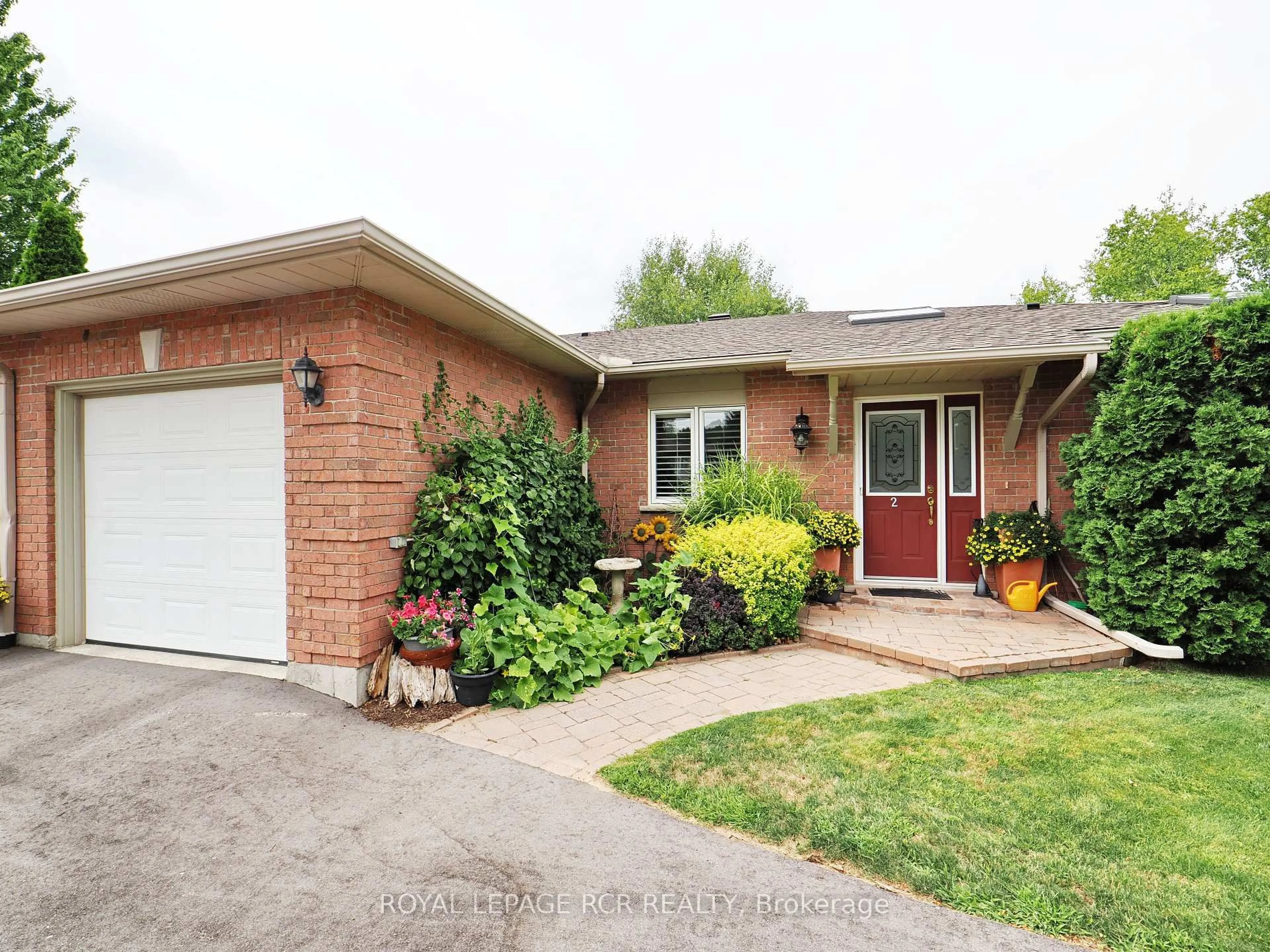 Home with brick exterior material, street for 28 Reddington Dr #2, Caledon Ontario L7E 0E4