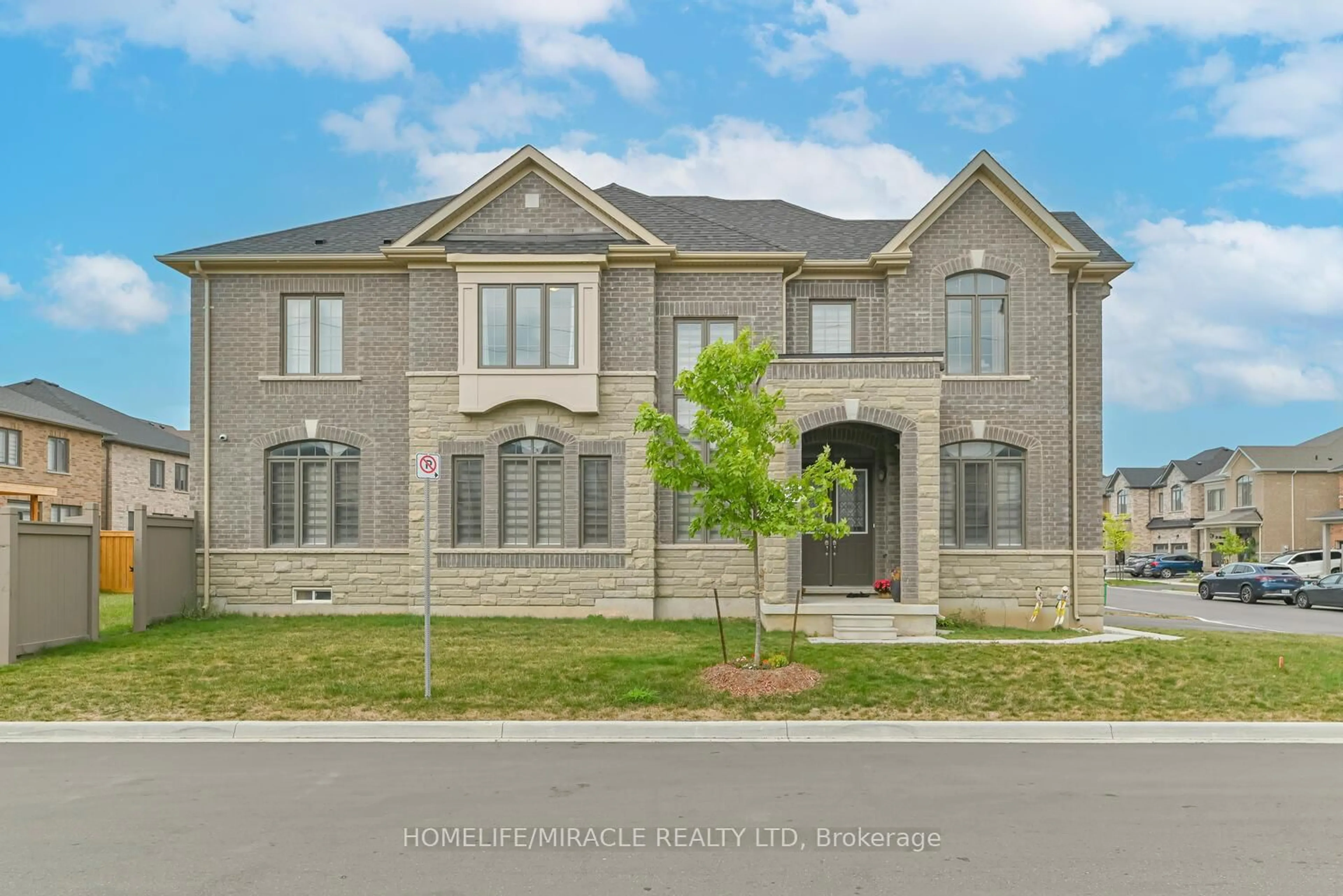 Home with brick exterior material, street for 9 Bavenden Cres, Brampton Ontario L6X 0J8