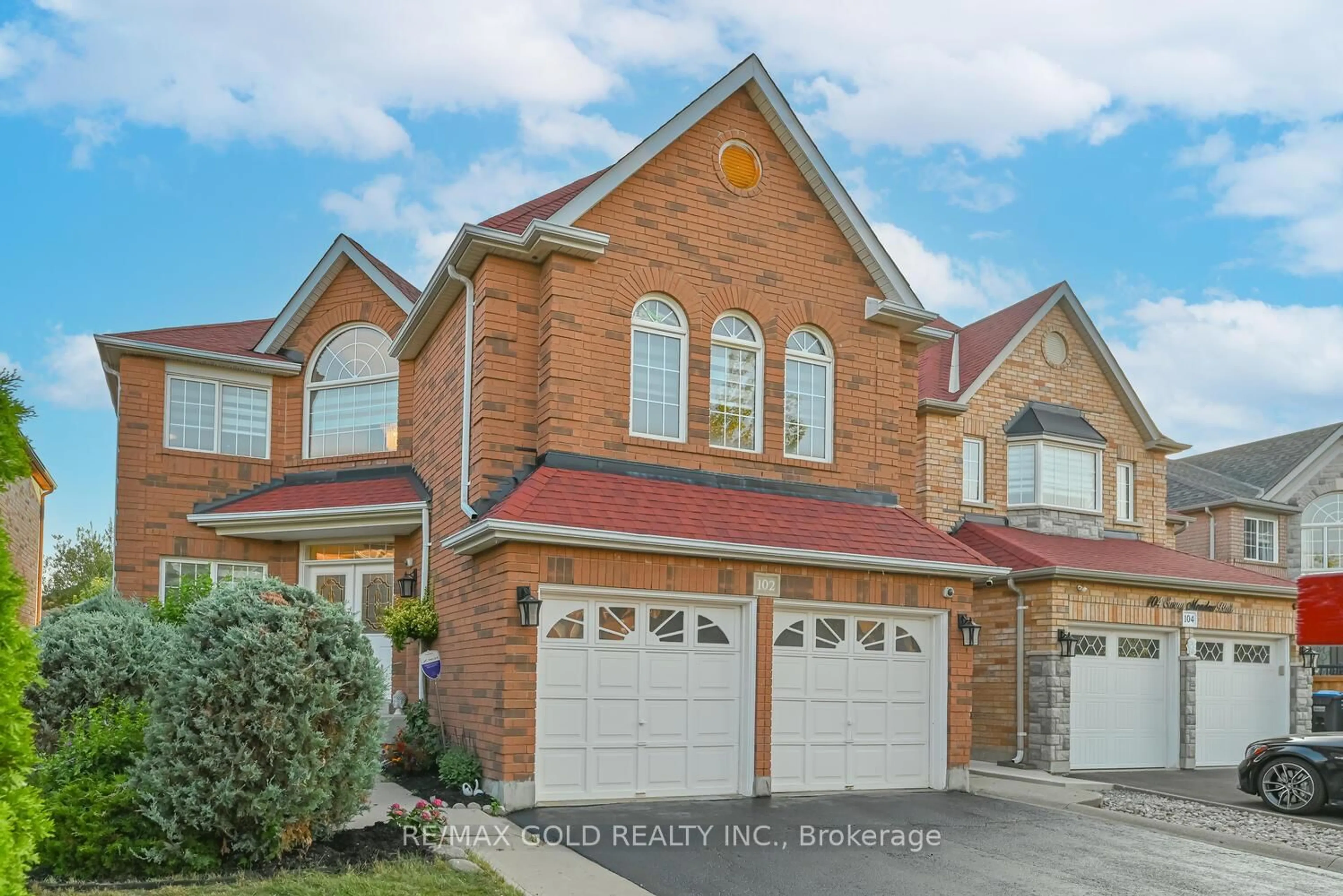 Home with brick exterior material, street for 102 Sunny Meadow Blvd, Brampton Ontario L6R 1X5