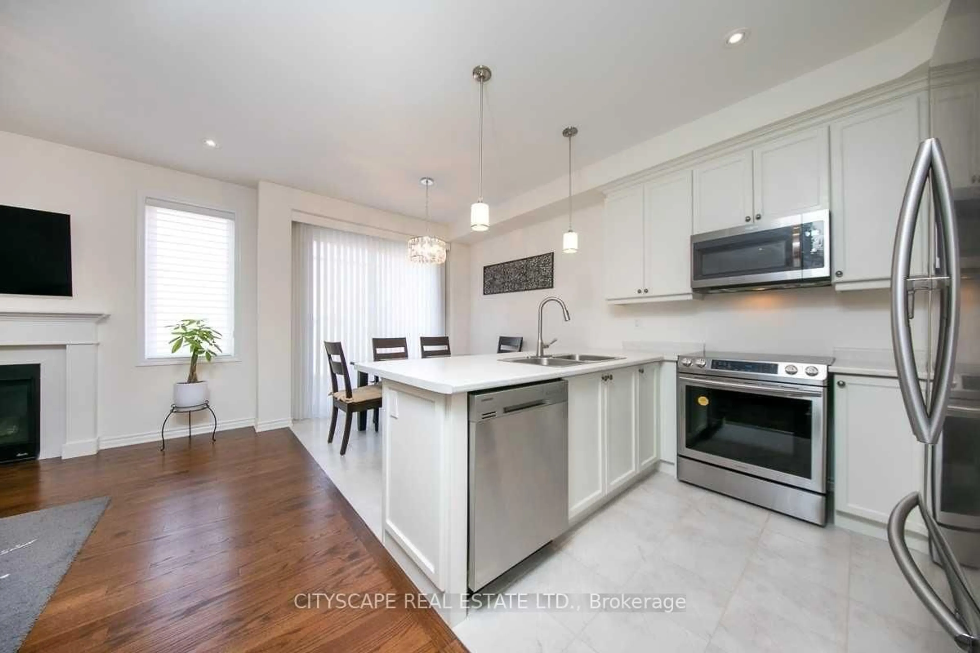 Open concept kitchen, unknown for 141 Hatt Crt, Milton Ontario L9E 1G7