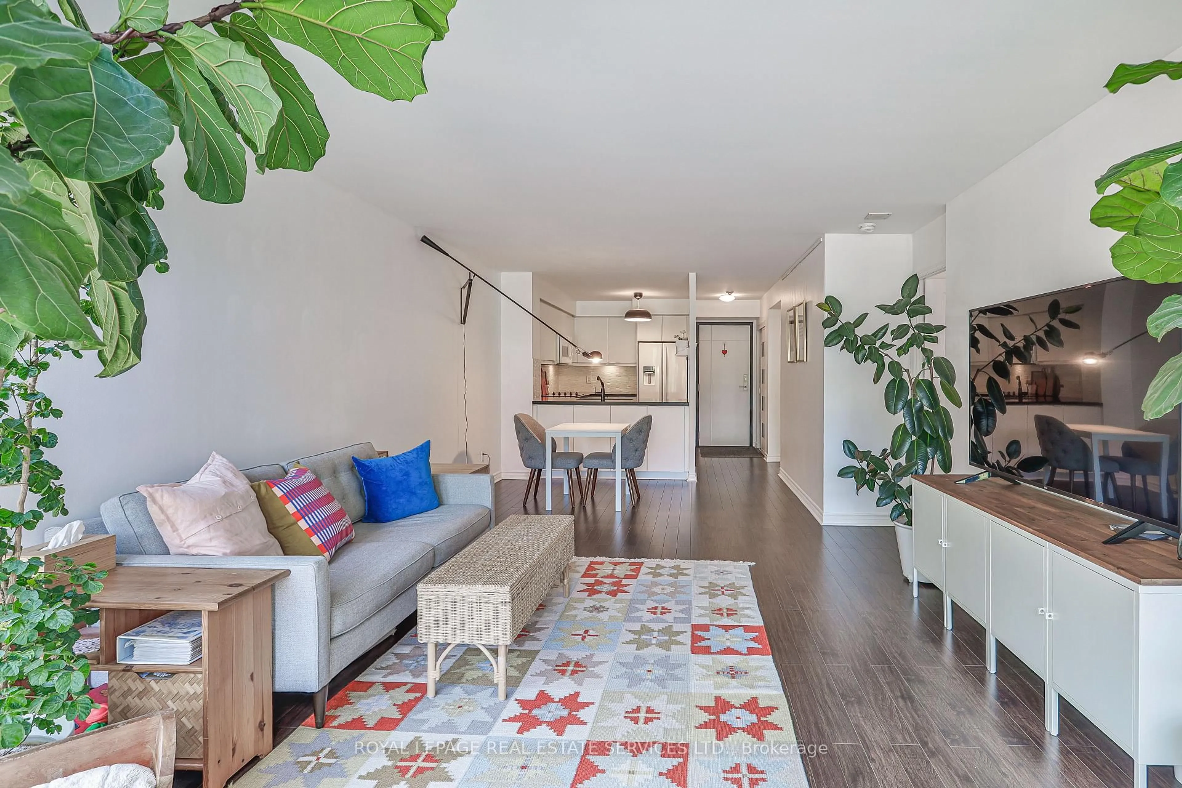 Living room with furniture, wood/laminate floor for 2267 Lakeshore Blvd #216, Toronto Ontario M8V 3X2