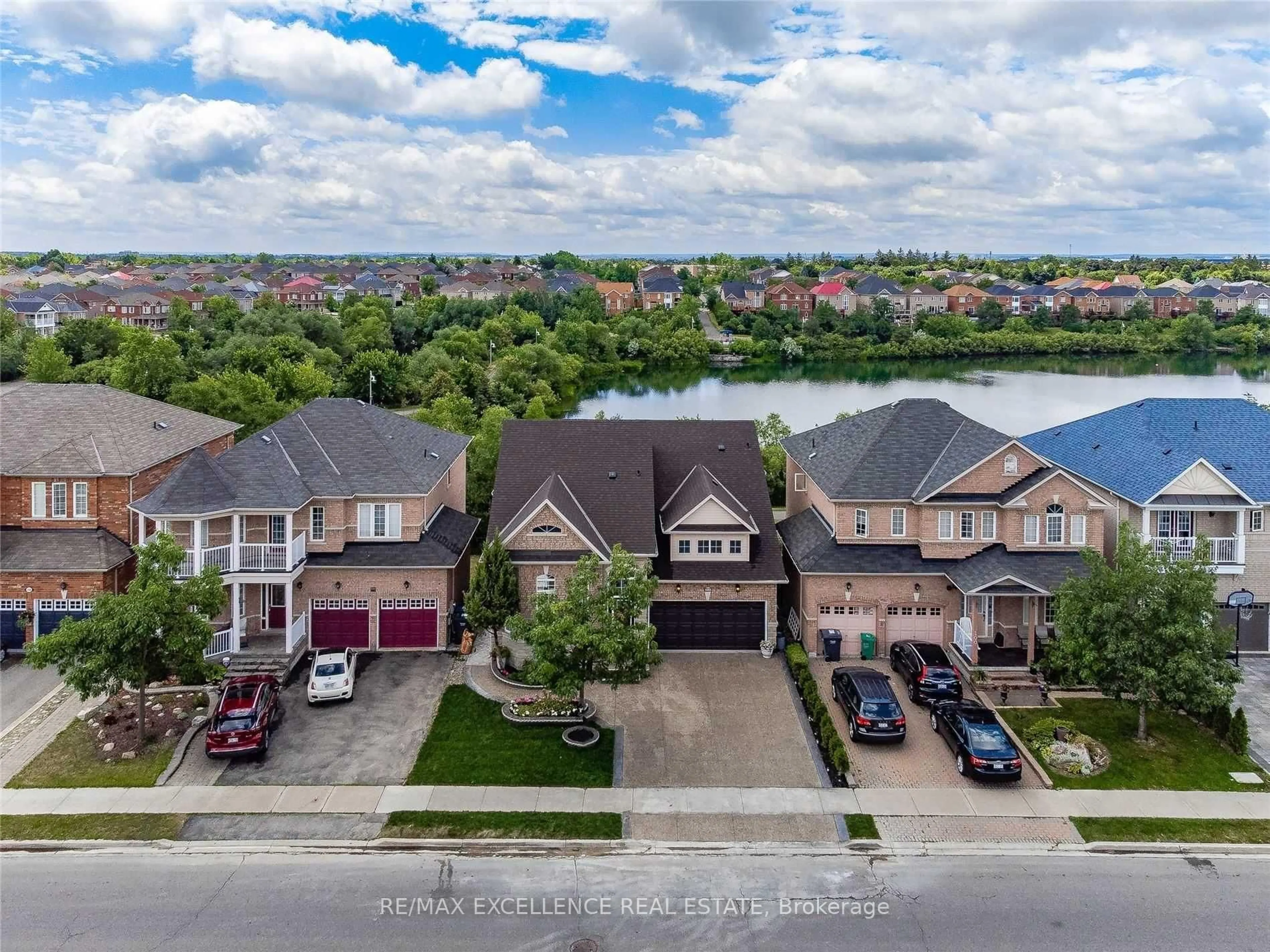 A pic from outside/outdoor area/front of a property/back of a property/a pic from drone, water/lake/river/ocean view for 102 Southlake Blvd, Brampton Ontario L6V 4P2