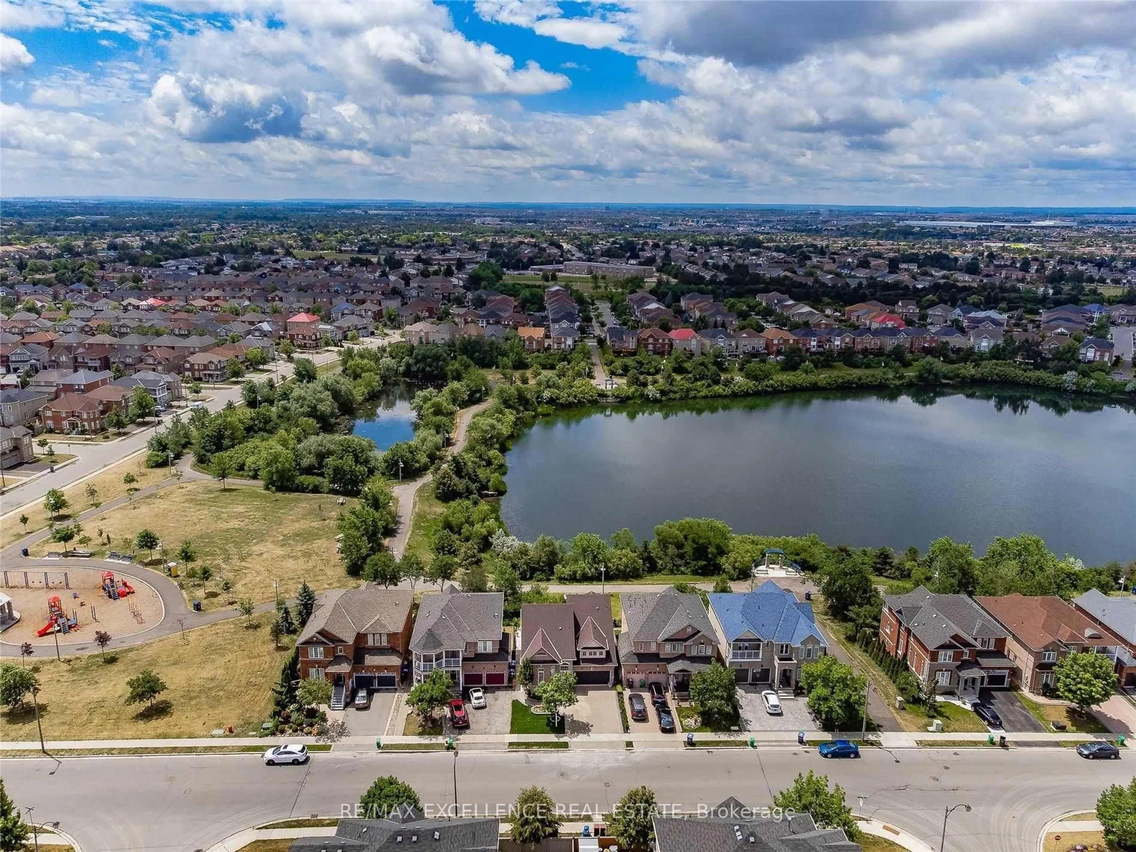 A pic from outside/outdoor area/front of a property/back of a property/a pic from drone, water/lake/river/ocean view for 102 Southlake Blvd, Brampton Ontario L6V 4P2