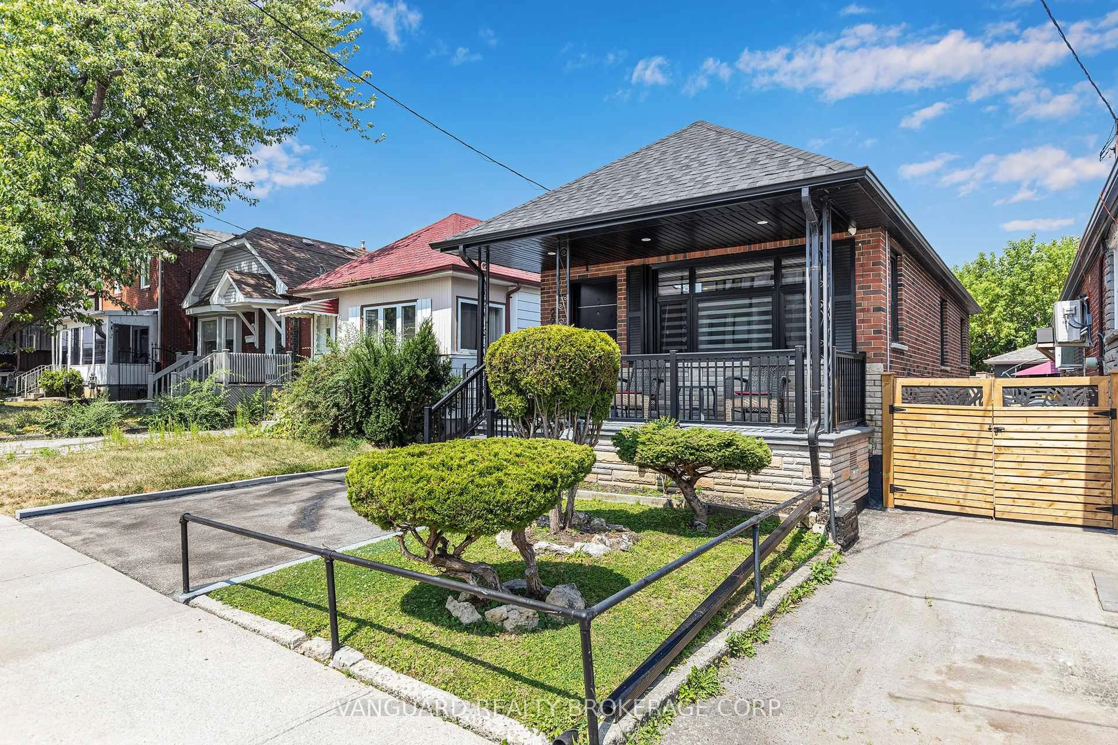 Home with brick exterior material, street for 220 Belgravia Ave, Toronto Ontario M6E 2M8