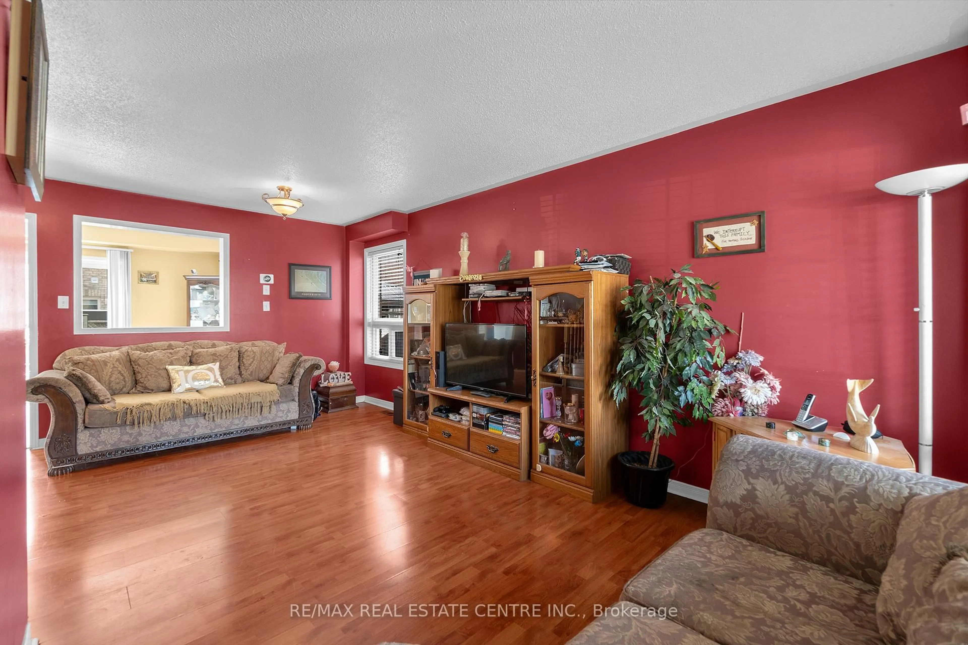 Living room with furniture, unknown for 140 Saintsbury Cres, Brampton Ontario L6R 2W4