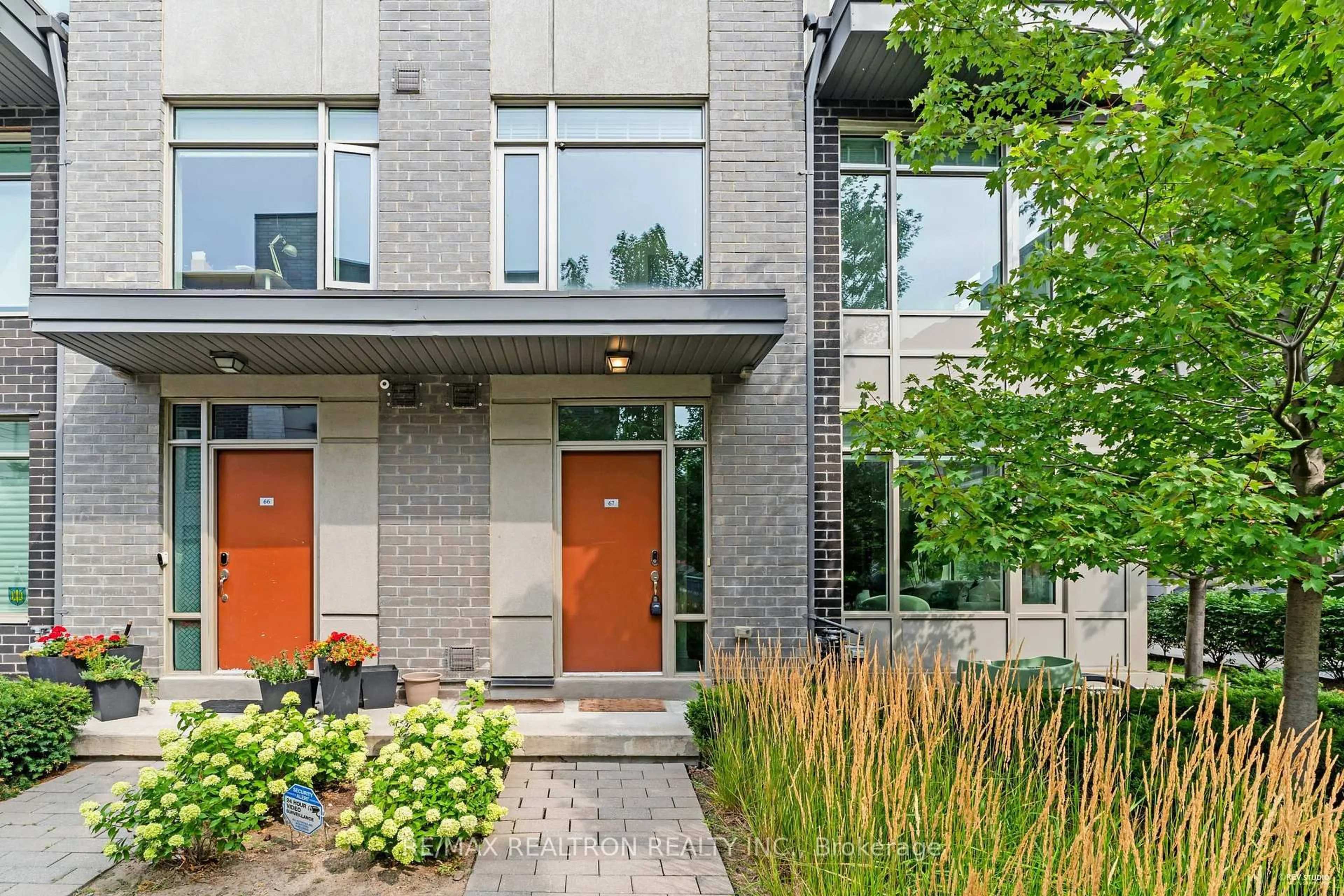 Home with brick exterior material, street for 31 Applewood Lane #67, Toronto Ontario M9C 0C1