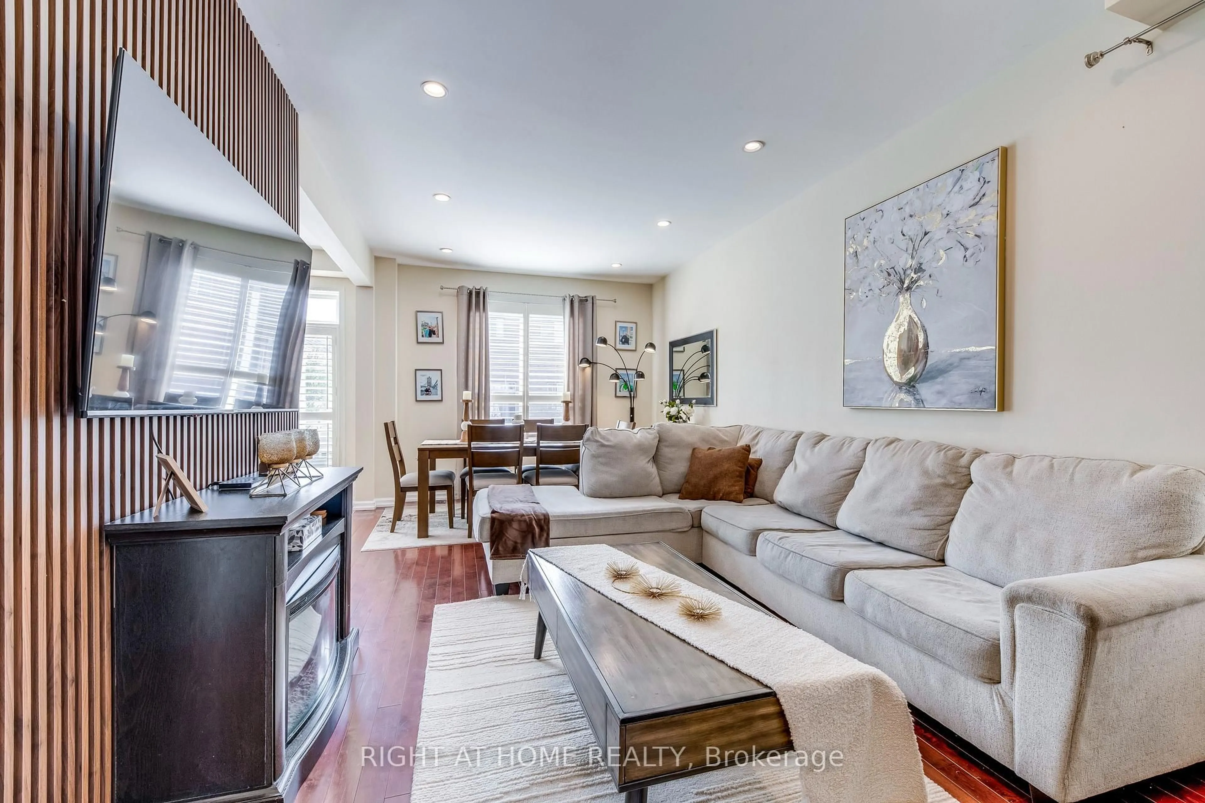 Living room with furniture, wood/laminate floor for 3048 Jenn Ave, Burlington Ontario L7M 0C8
