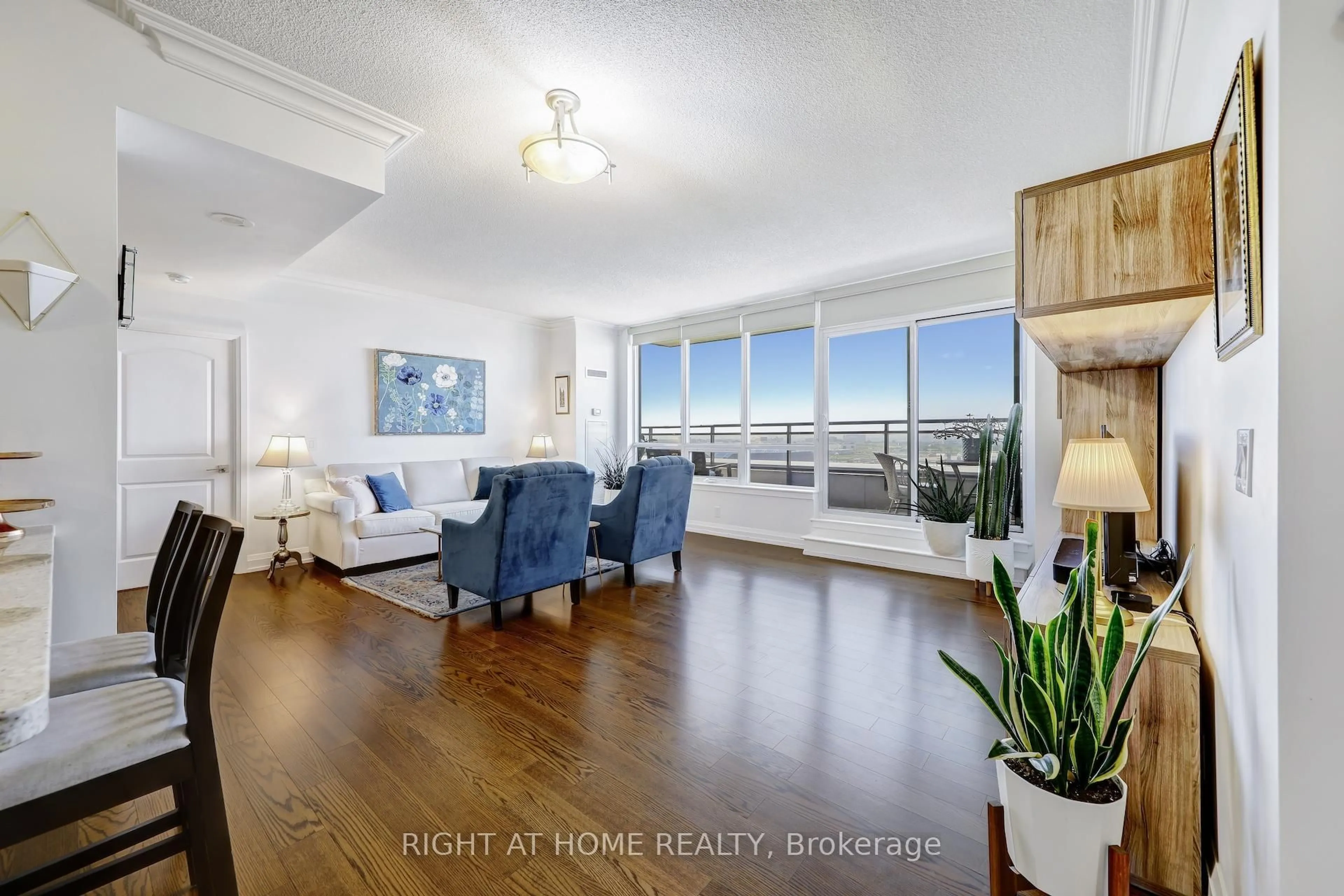 Living room with furniture, wood/laminate floor for 55 De Boers Dr #LPH04, Toronto Ontario M3J 0G5