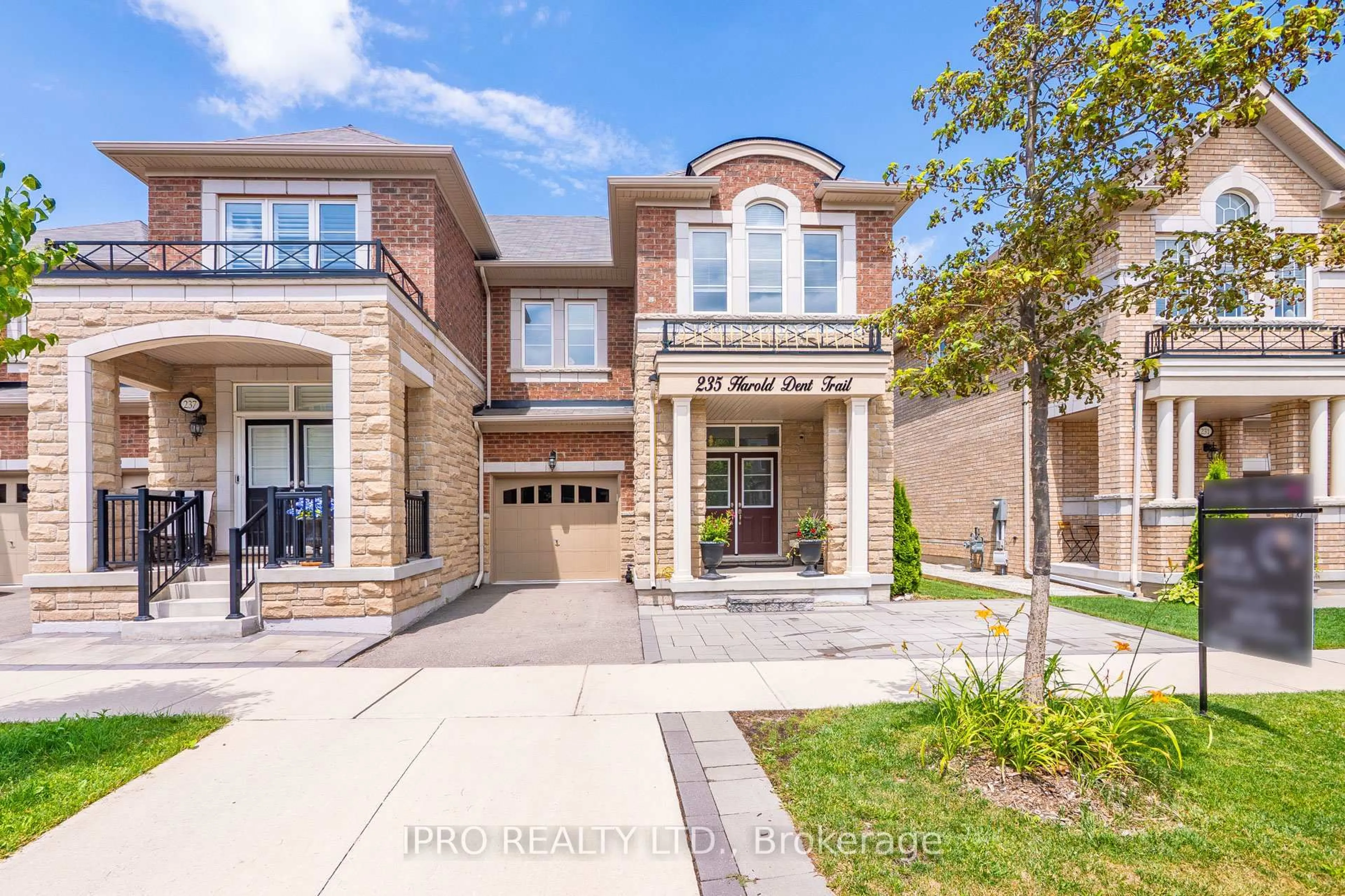 Home with brick exterior material, street for 235 Harold Dent Tr, Oakville Ontario L6M 1S3