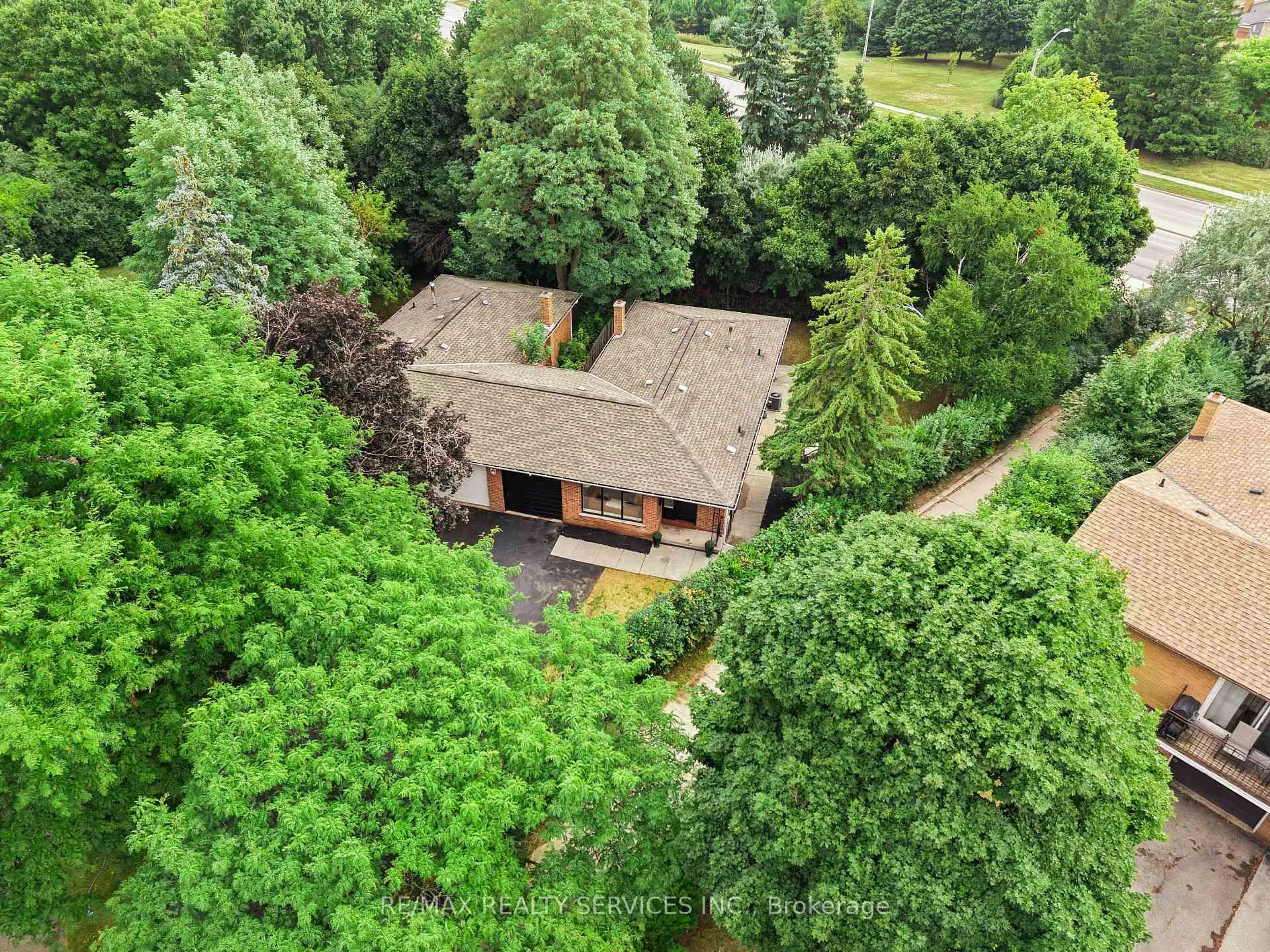 A pic from outside/outdoor area/front of a property/back of a property/a pic from drone, forest/trees view for 68 Montjoy Cres, Brampton Ontario L6S 3E7