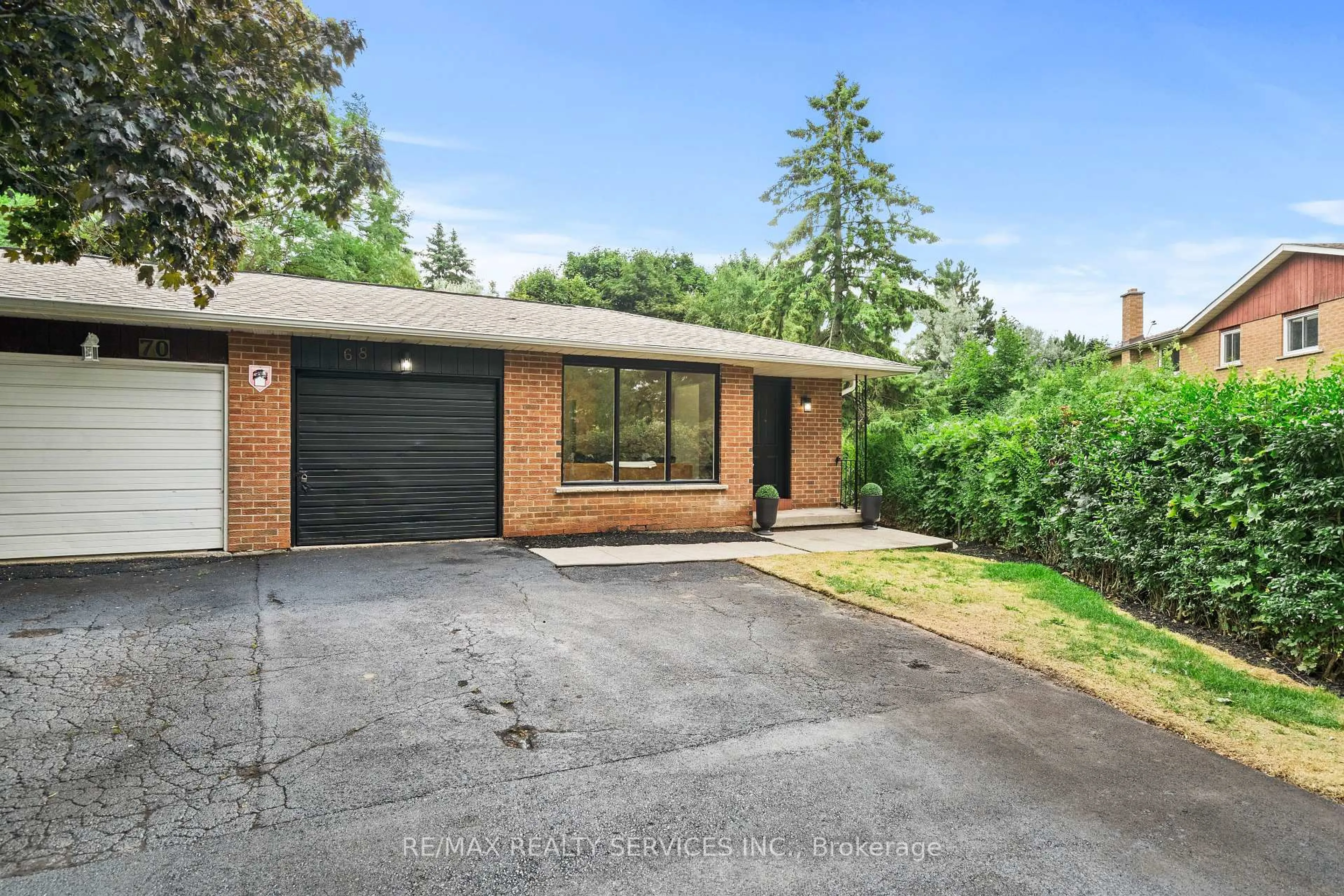 Home with brick exterior material, street for 68 Montjoy Cres, Brampton Ontario L6S 3E7
