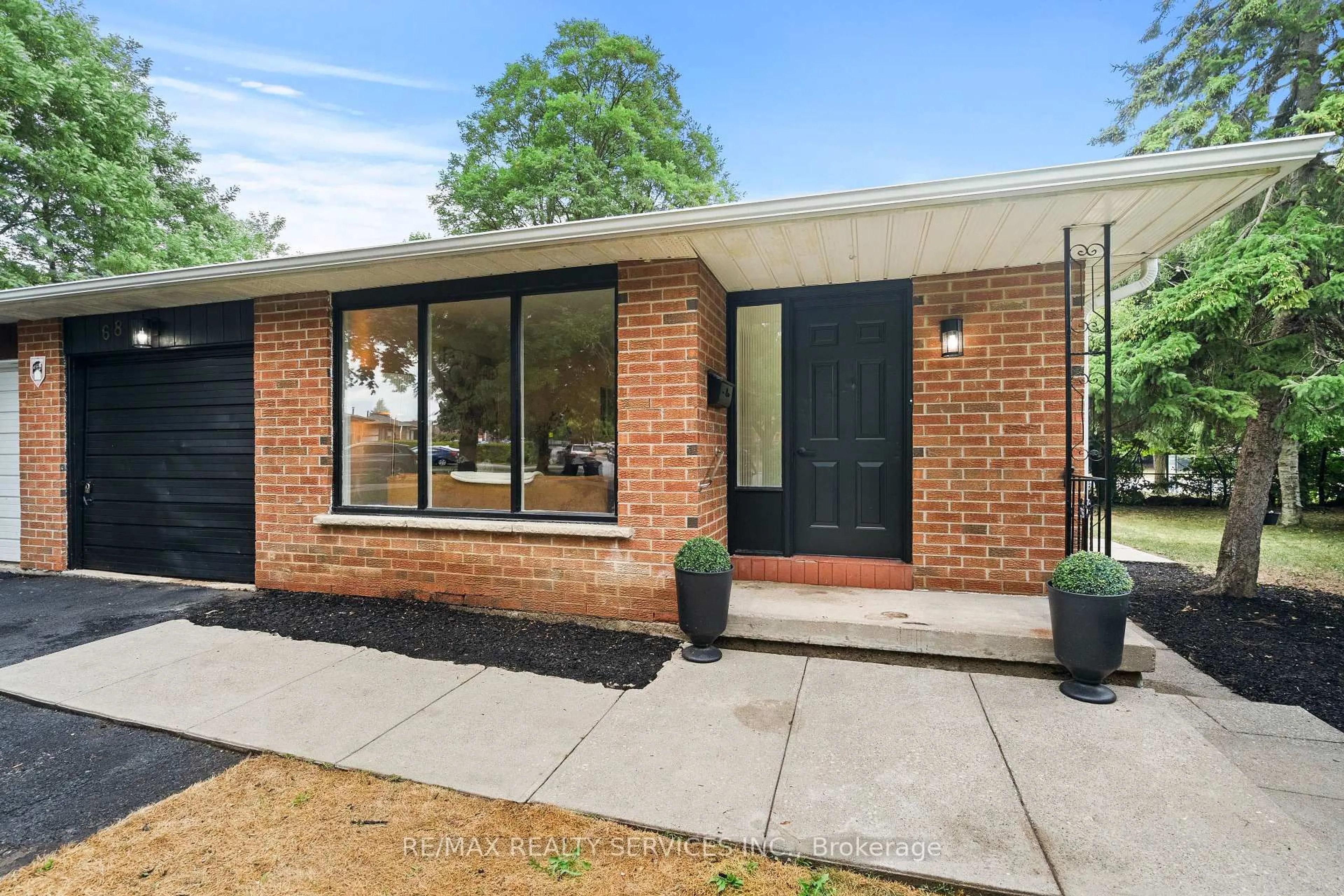 Home with brick exterior material, street for 68 Montjoy Cres, Brampton Ontario L6S 3E7