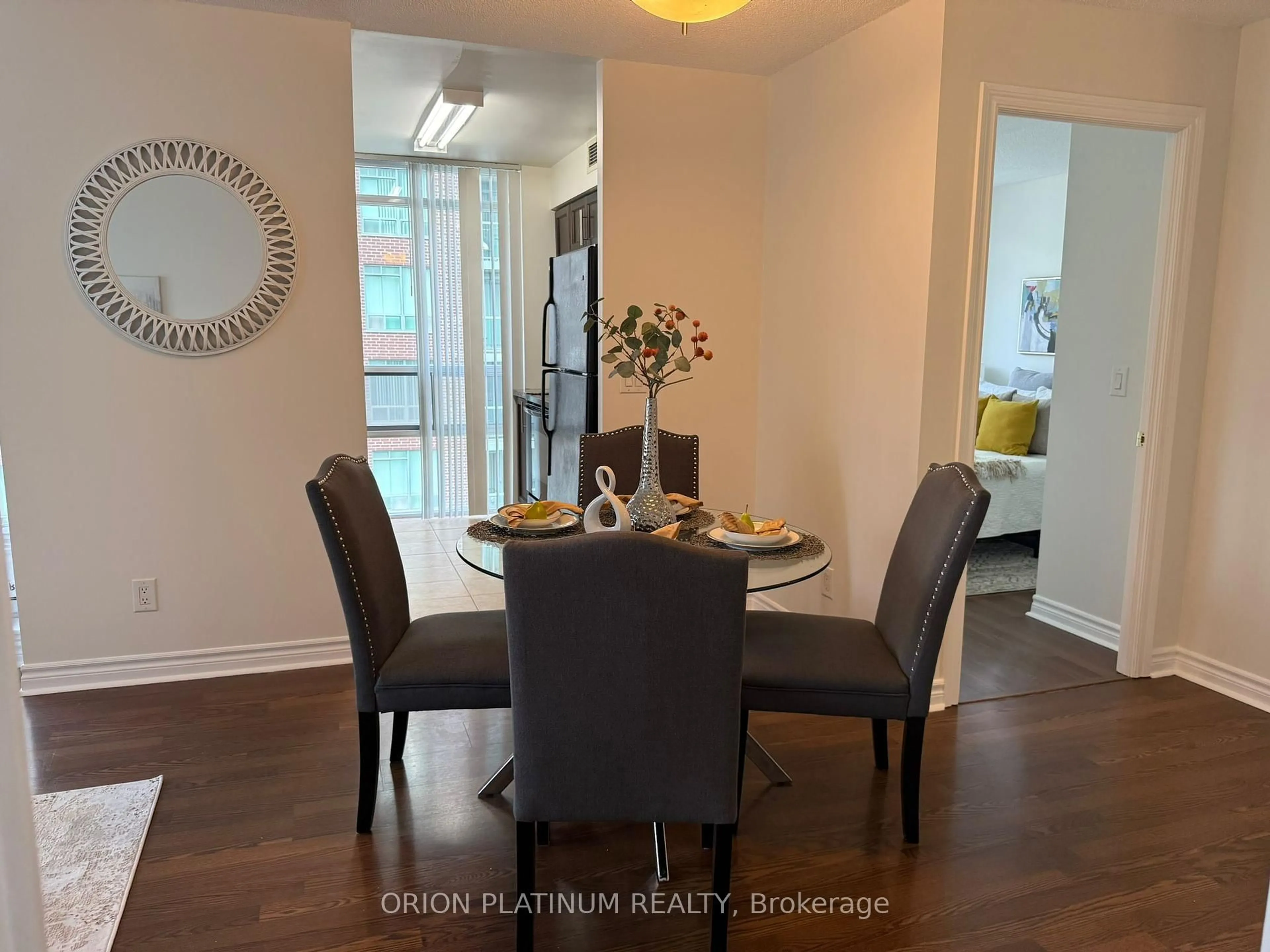 Dining room, wood/laminate floor for 5 Michael Power Pl #907, Toronto Ontario M9A 0A3