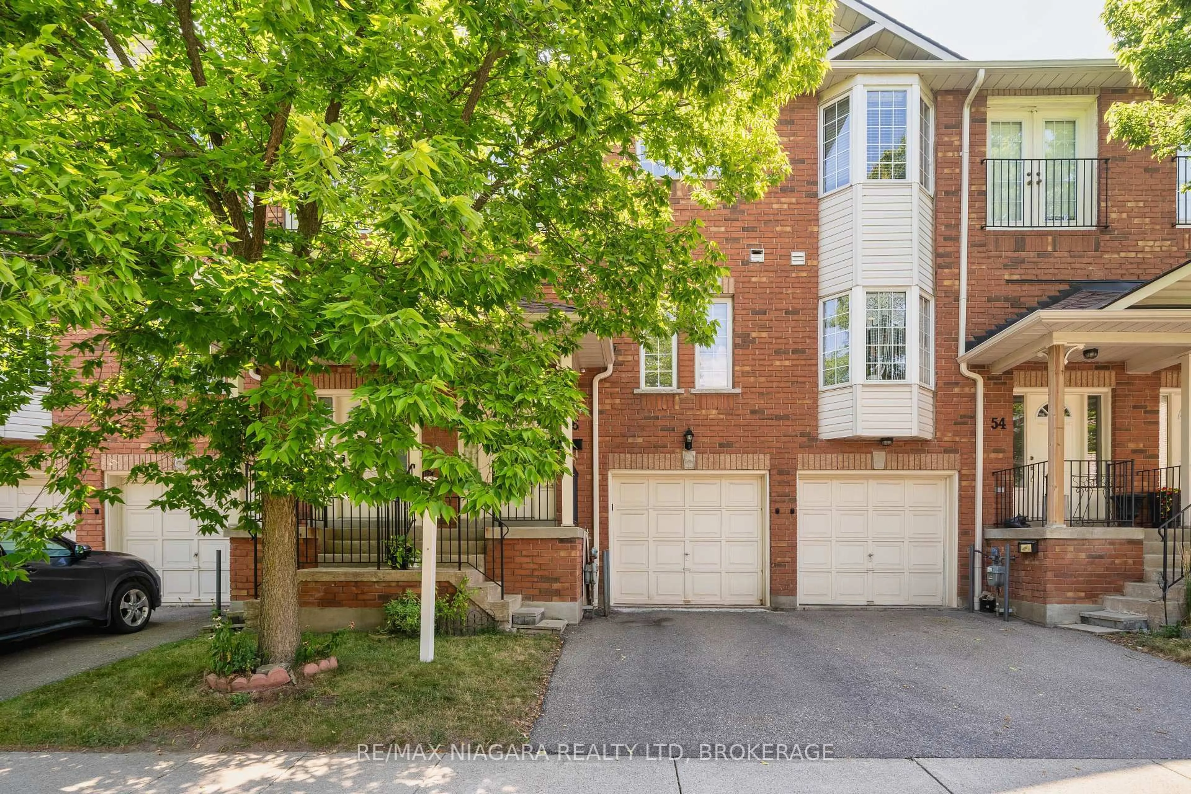 Home with brick exterior material, street for 1130 Cawthra Rd #56, Mississauga Ontario L5G 4V7