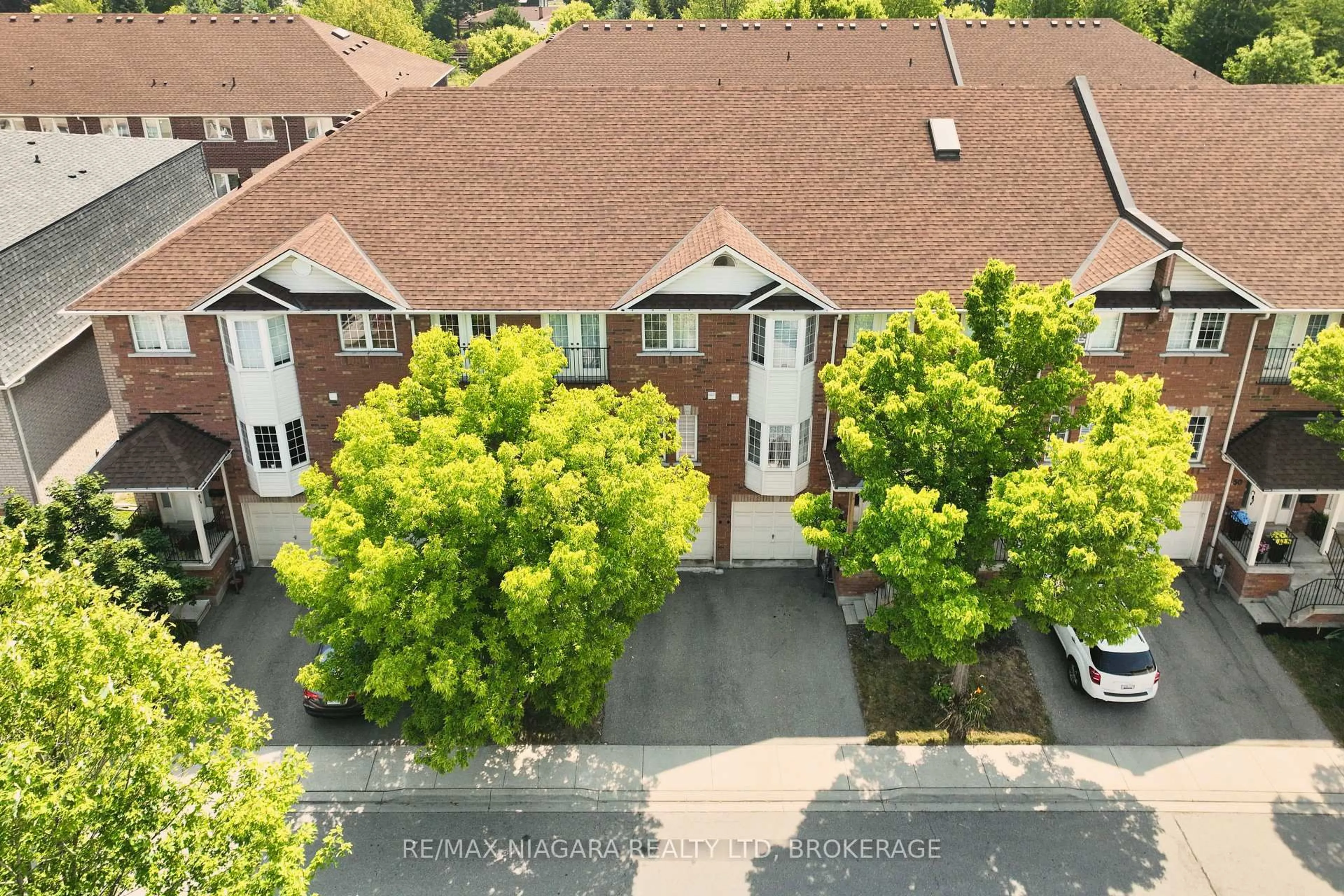 A pic from outside/outdoor area/front of a property/back of a property/a pic from drone, street for 1130 Cawthra Rd #56, Mississauga Ontario L5G 4V7