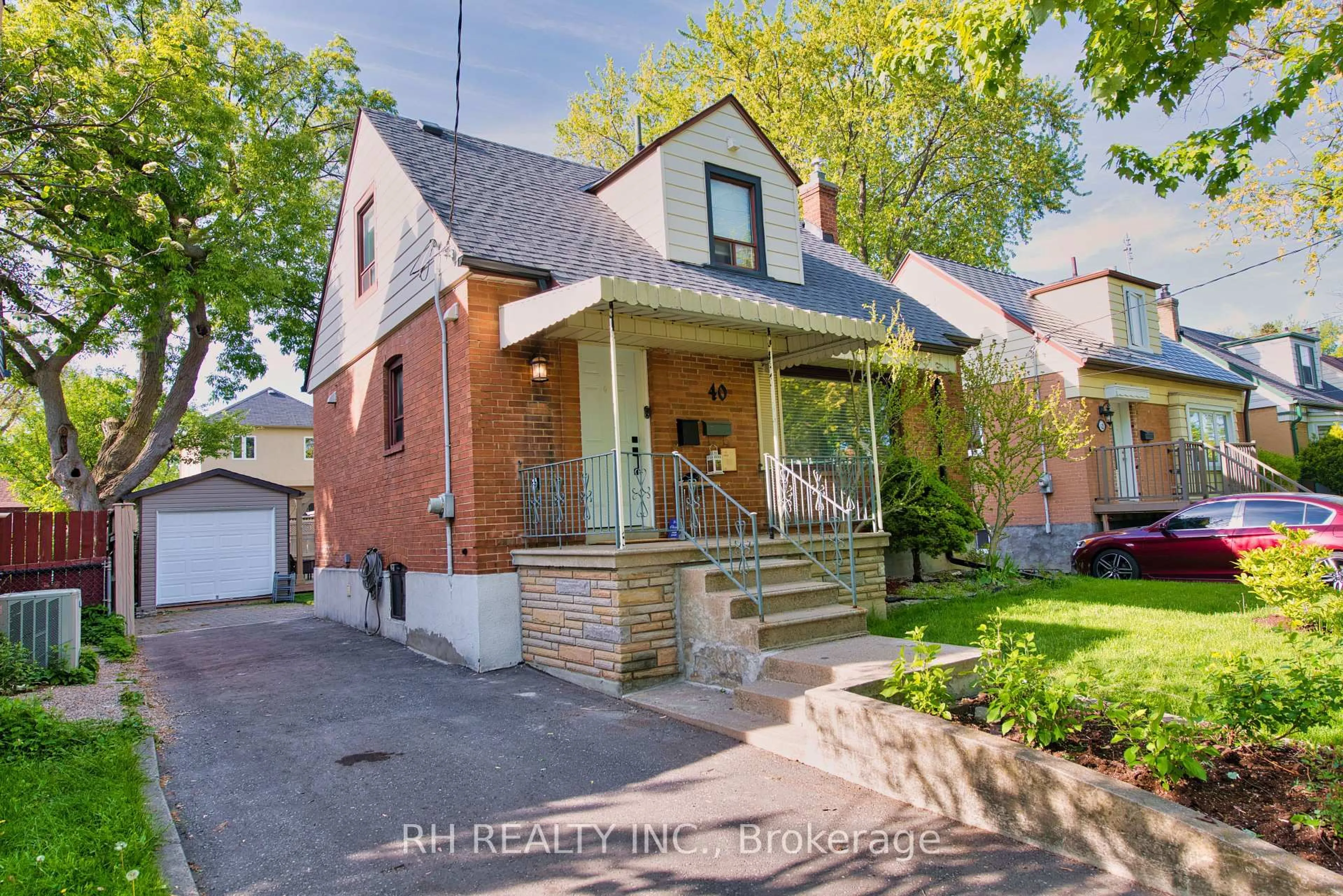 Home with brick exterior material, street for 40 Patika Ave, Toronto Ontario M9N 2E9