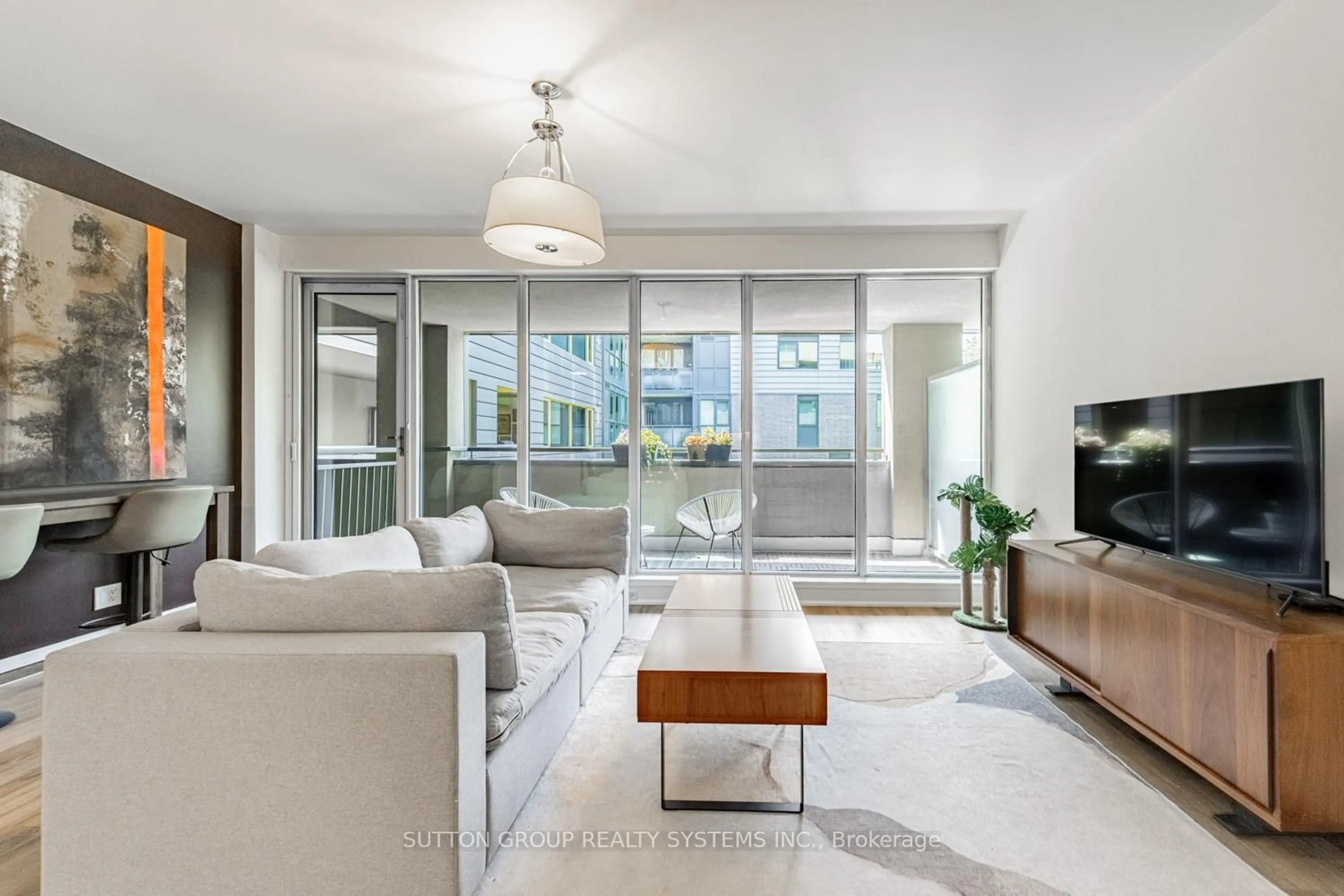 Living room with furniture, unknown for 25 Ritchie Ave #310, Toronto Ontario M6R 2J6