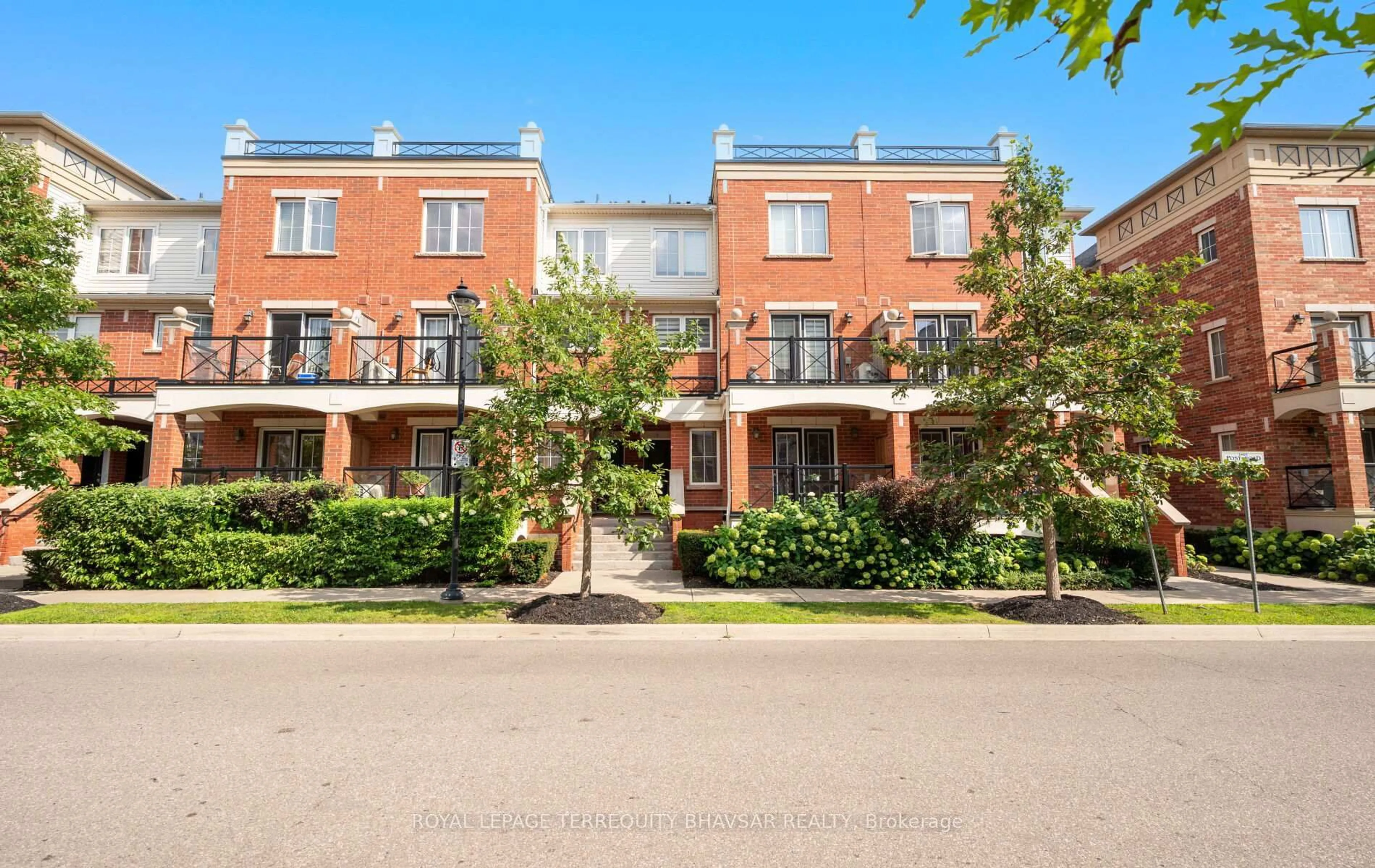 A pic from outside/outdoor area/front of a property/back of a property/a pic from drone, street for 2460 Post Rd #4, Oakville Ontario L6H 0J2