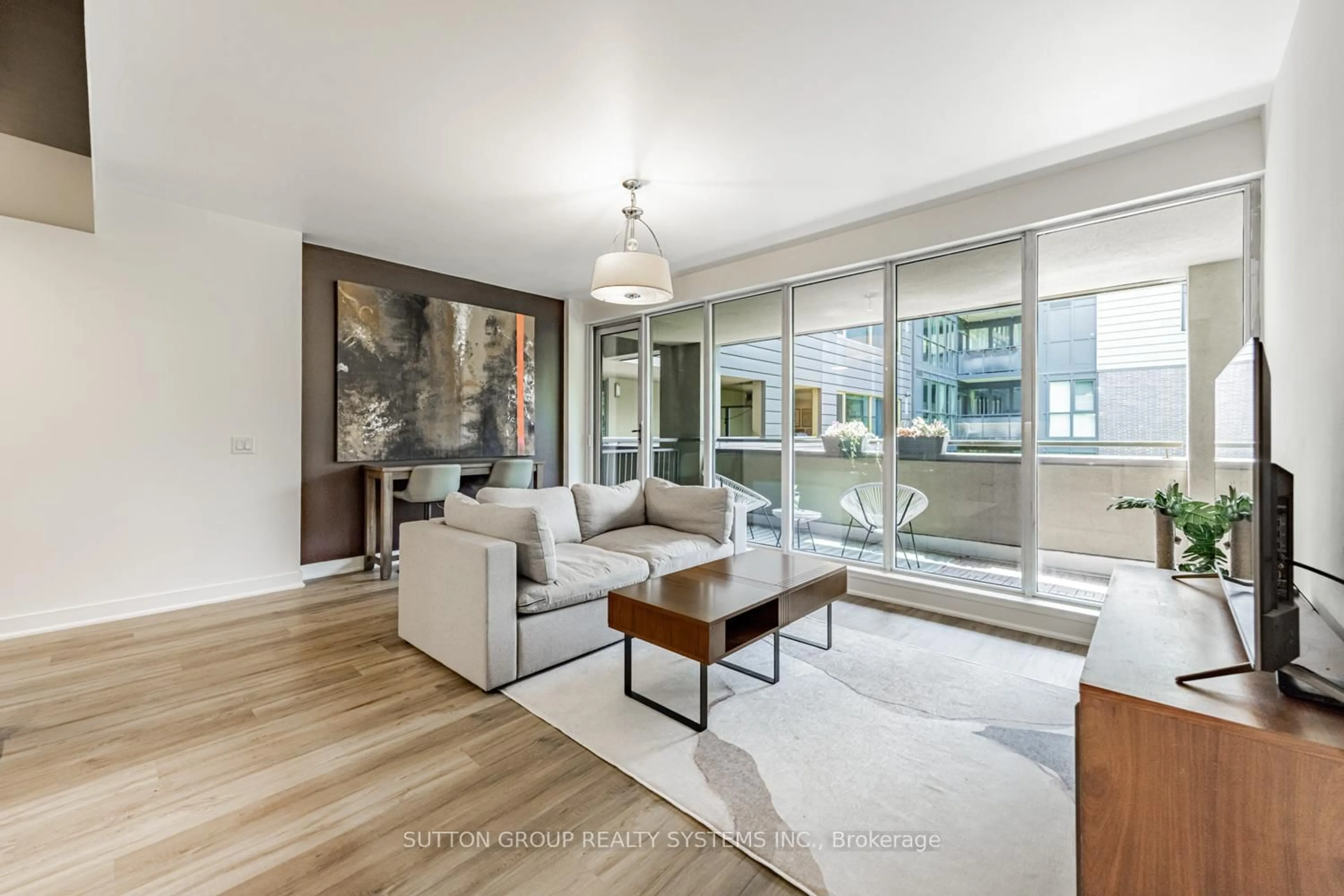 Living room with furniture, unknown for 25 Ritchie Ave #310, Toronto Ontario M6R 2J6