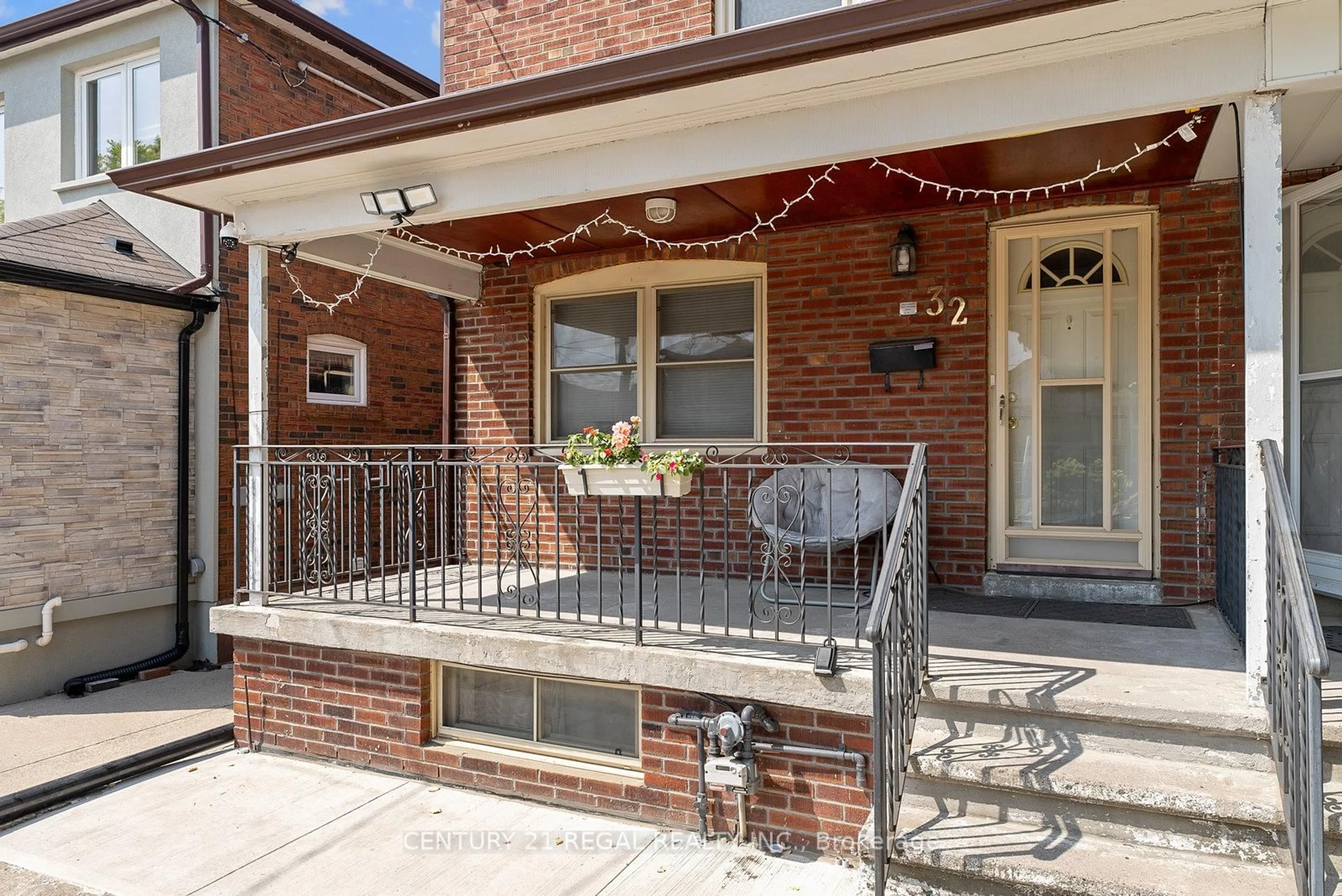 Home with brick exterior material, street for 32 Chamberlain Ave, Toronto Ontario M6E 4J8