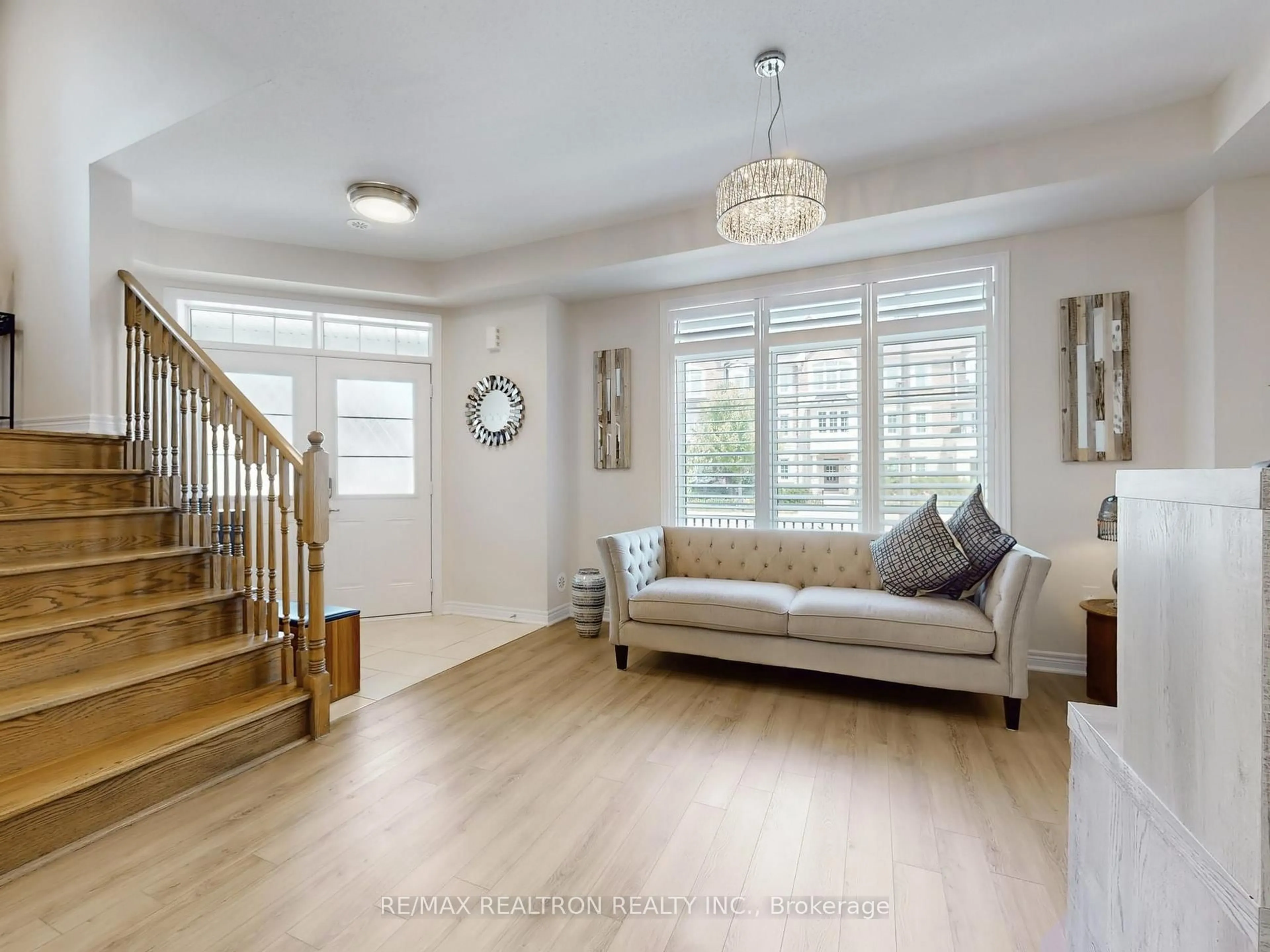 Living room with furniture, wood/laminate floor for 3050 George Savage Ave, Oakville Ontario L6M 0Z1