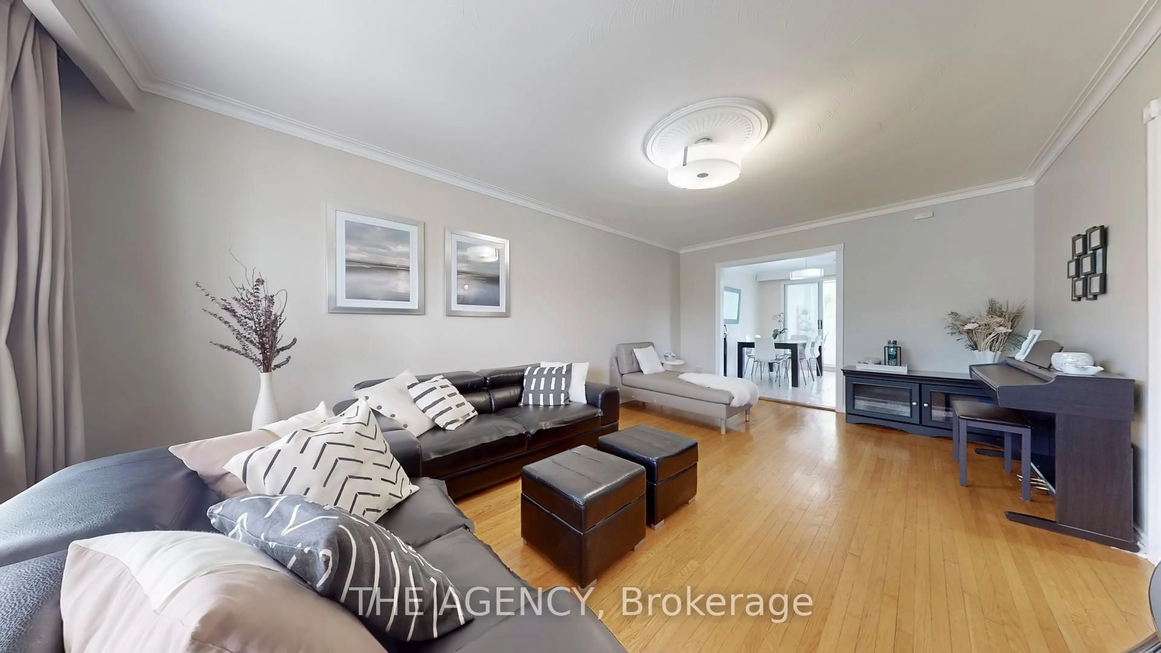 Living room with furniture, wood/laminate floor for 7 Purchase Pl, Toronto Ontario M3L 1T9