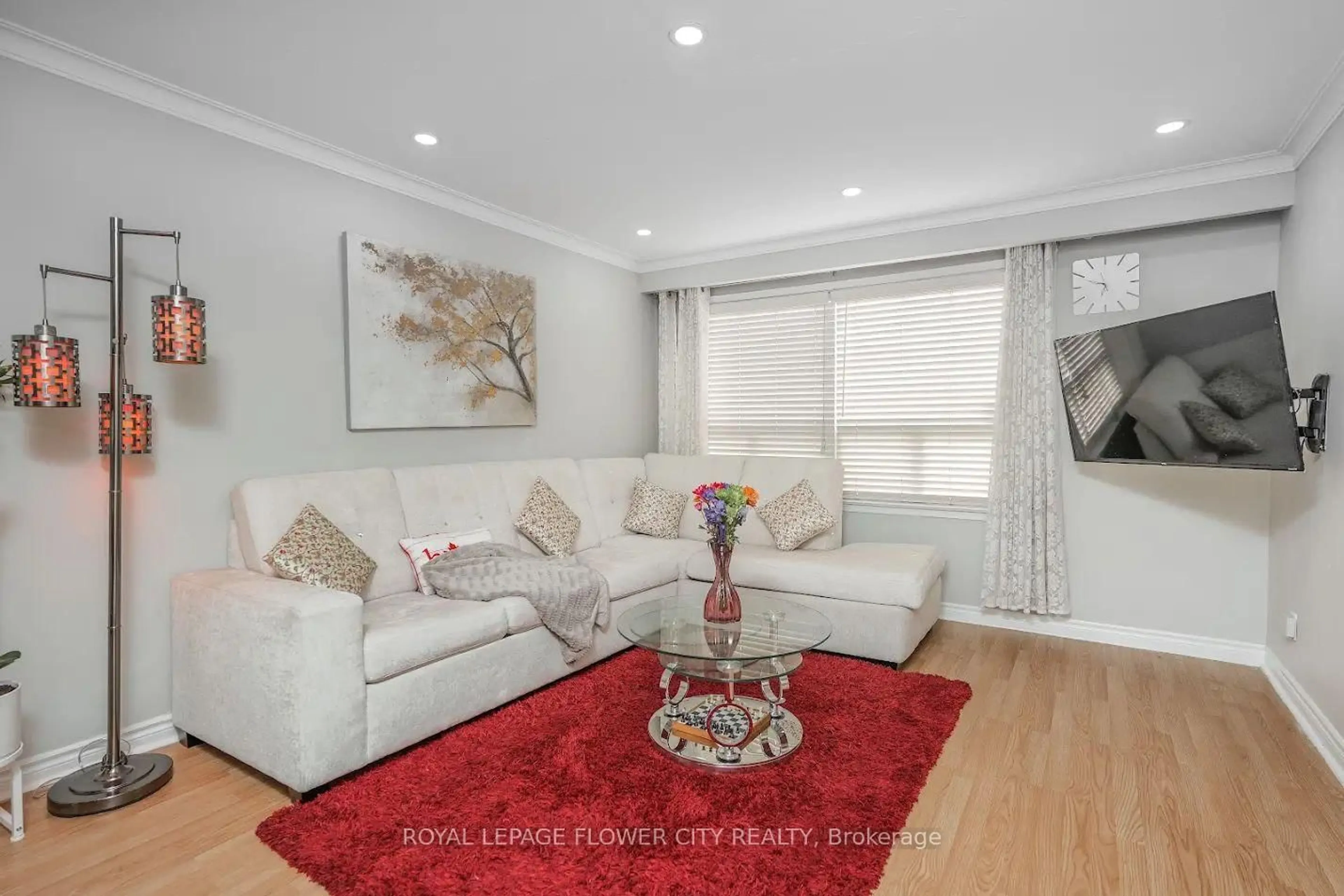 Living room with furniture, wood/laminate floor for 278 Elmhurst Dr, Toronto Ontario M9W 2M2