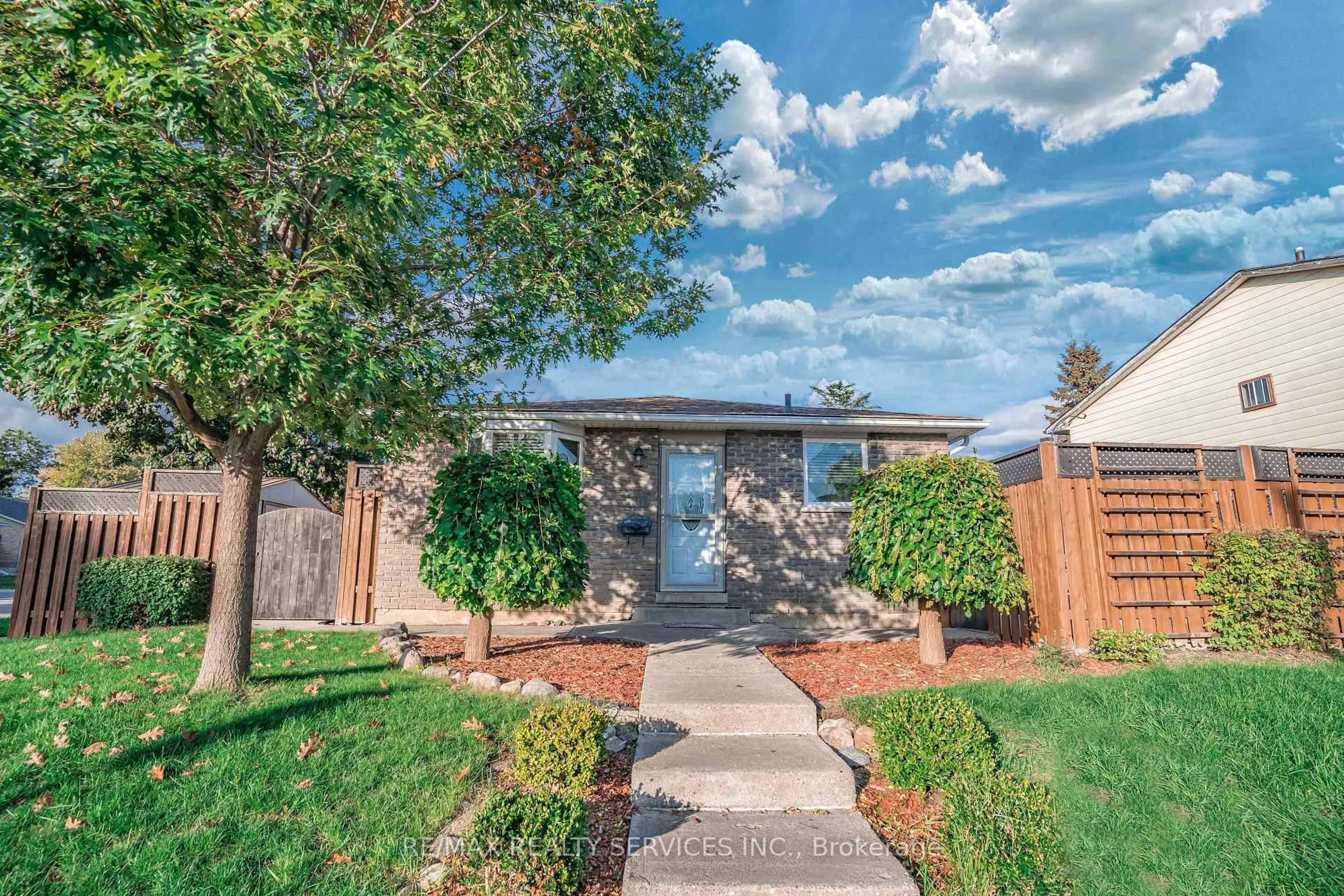 Home with brick exterior material, street for 66 Tindale Rd, Brampton Ontario L6V 2G9
