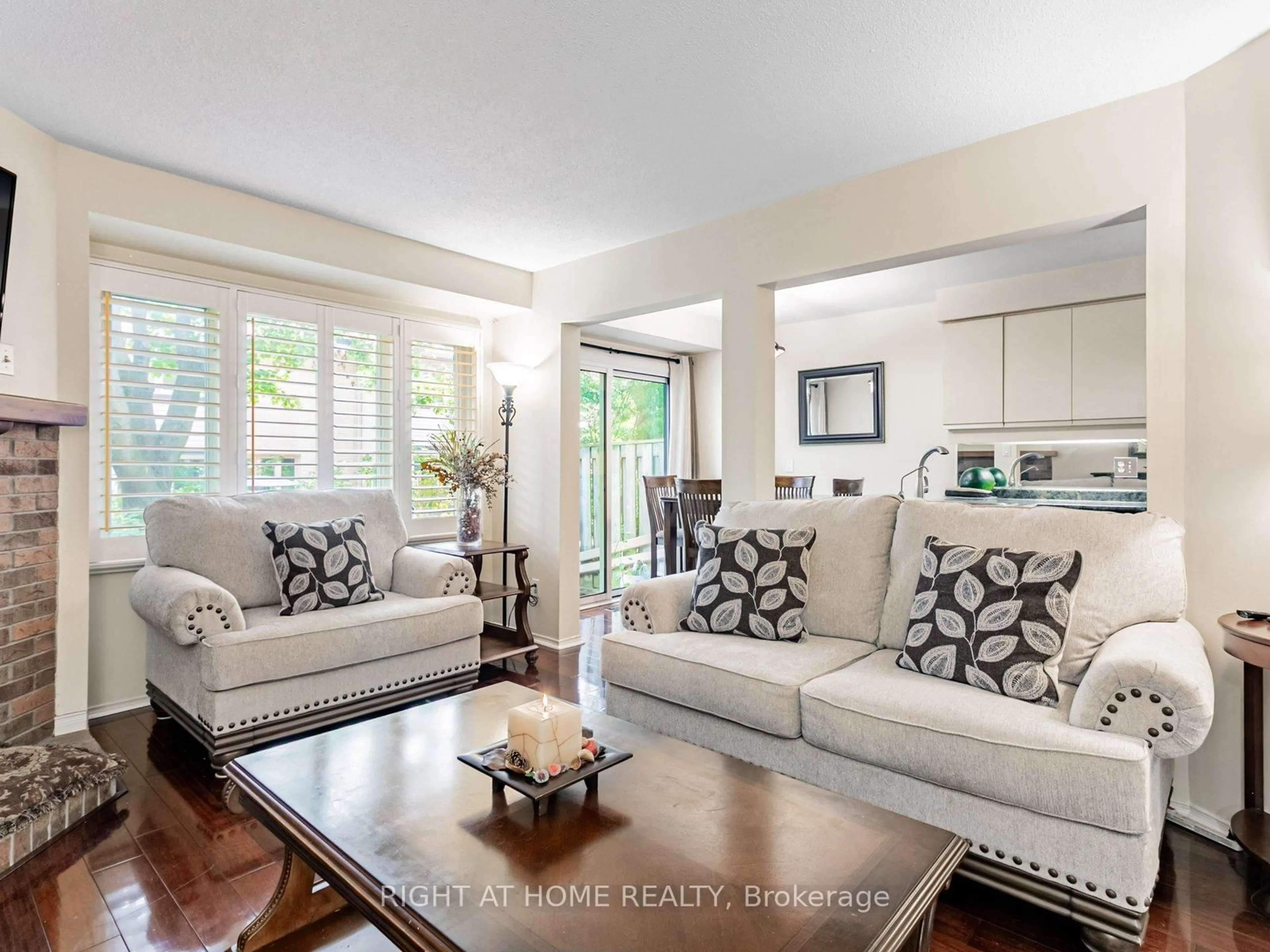 Living room with furniture, unknown for 2275 Credit Valley Rd #115, Mississauga Ontario L5M 4N5
