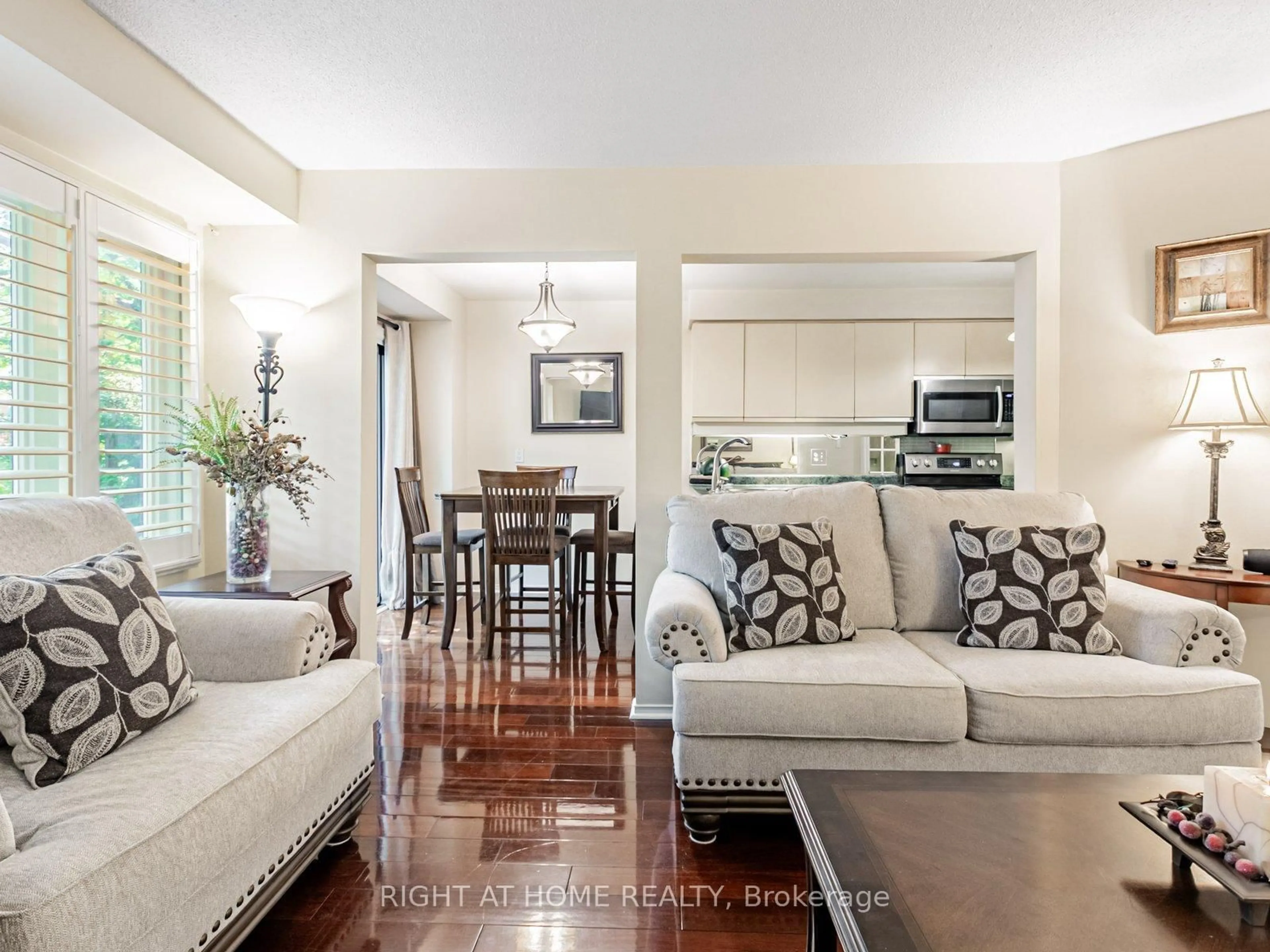 Living room with furniture, unknown for 2275 Credit Valley Rd #115, Mississauga Ontario L5M 4N5