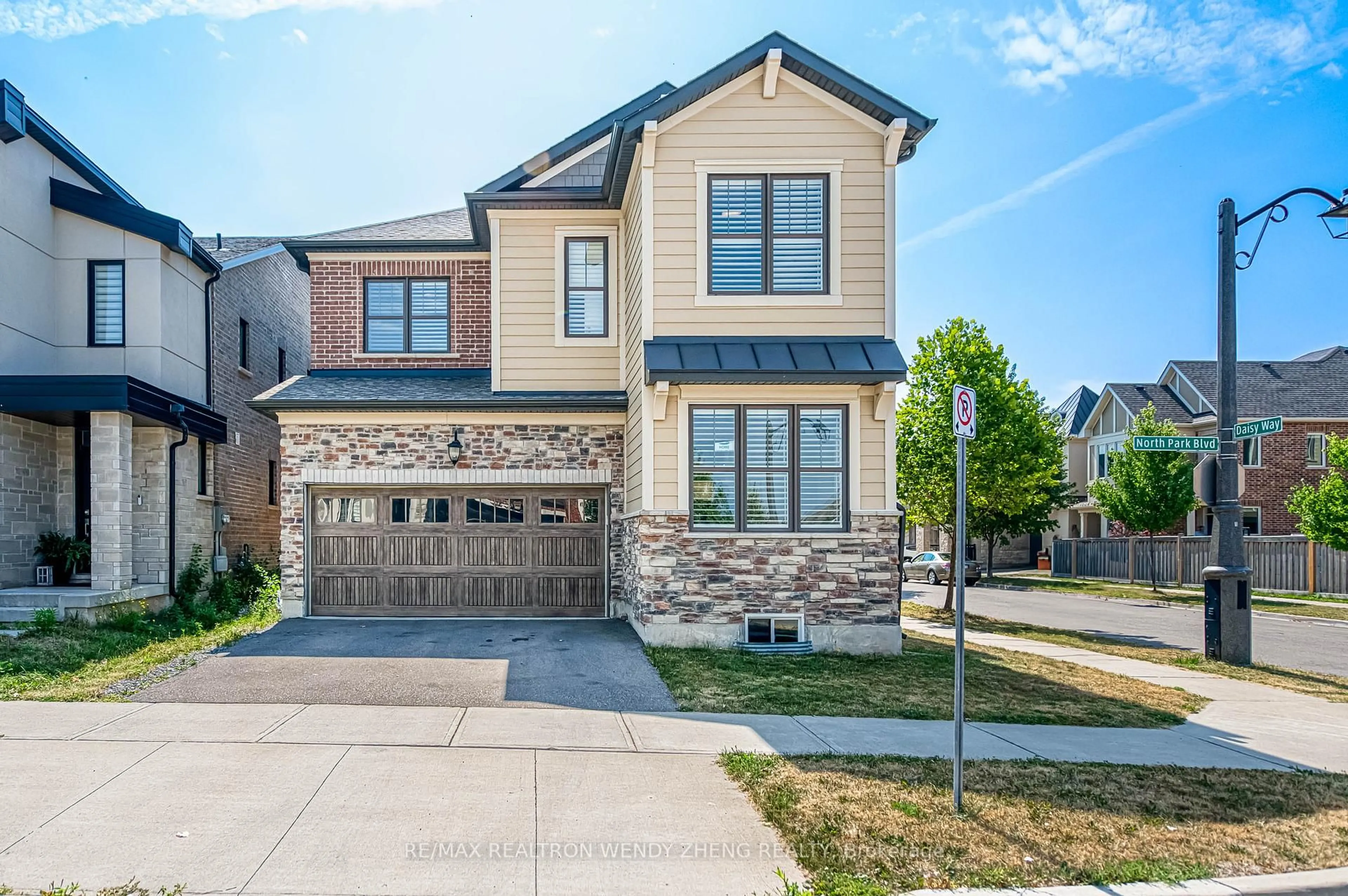 Home with brick exterior material, street for 3209 Daisy Way, Oakville Ontario L6M 1L4