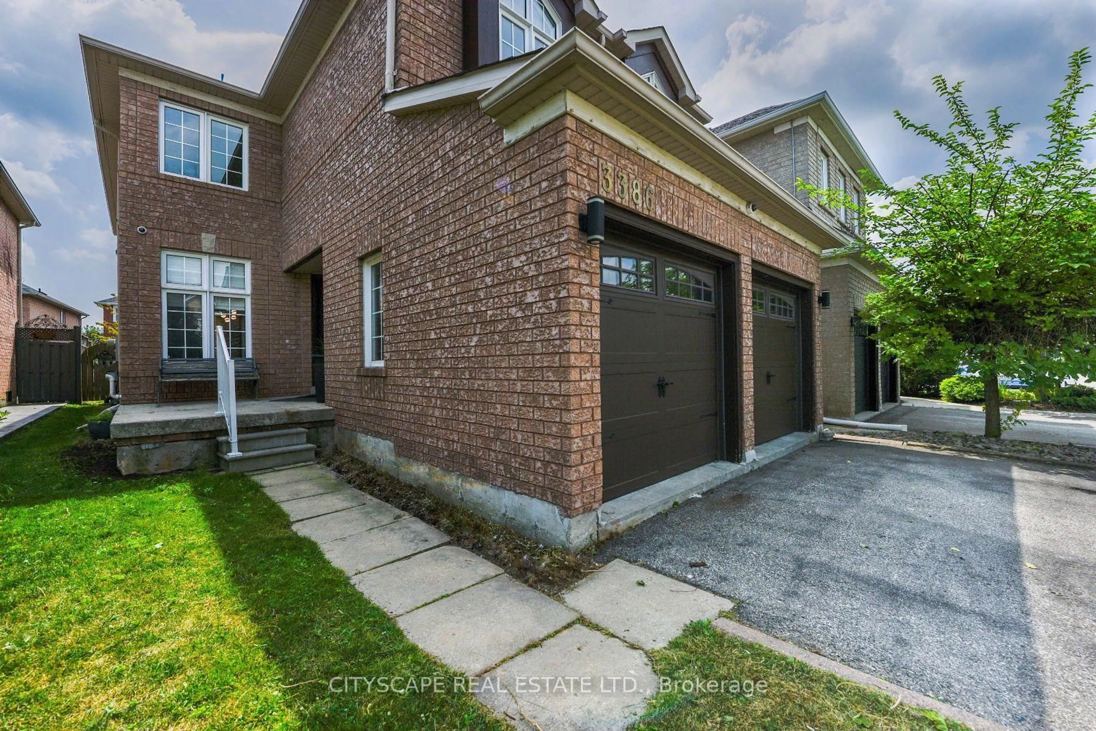 Home with brick exterior material, street for 3386 Gumwood Rd, Mississauga Ontario L5N 8A4
