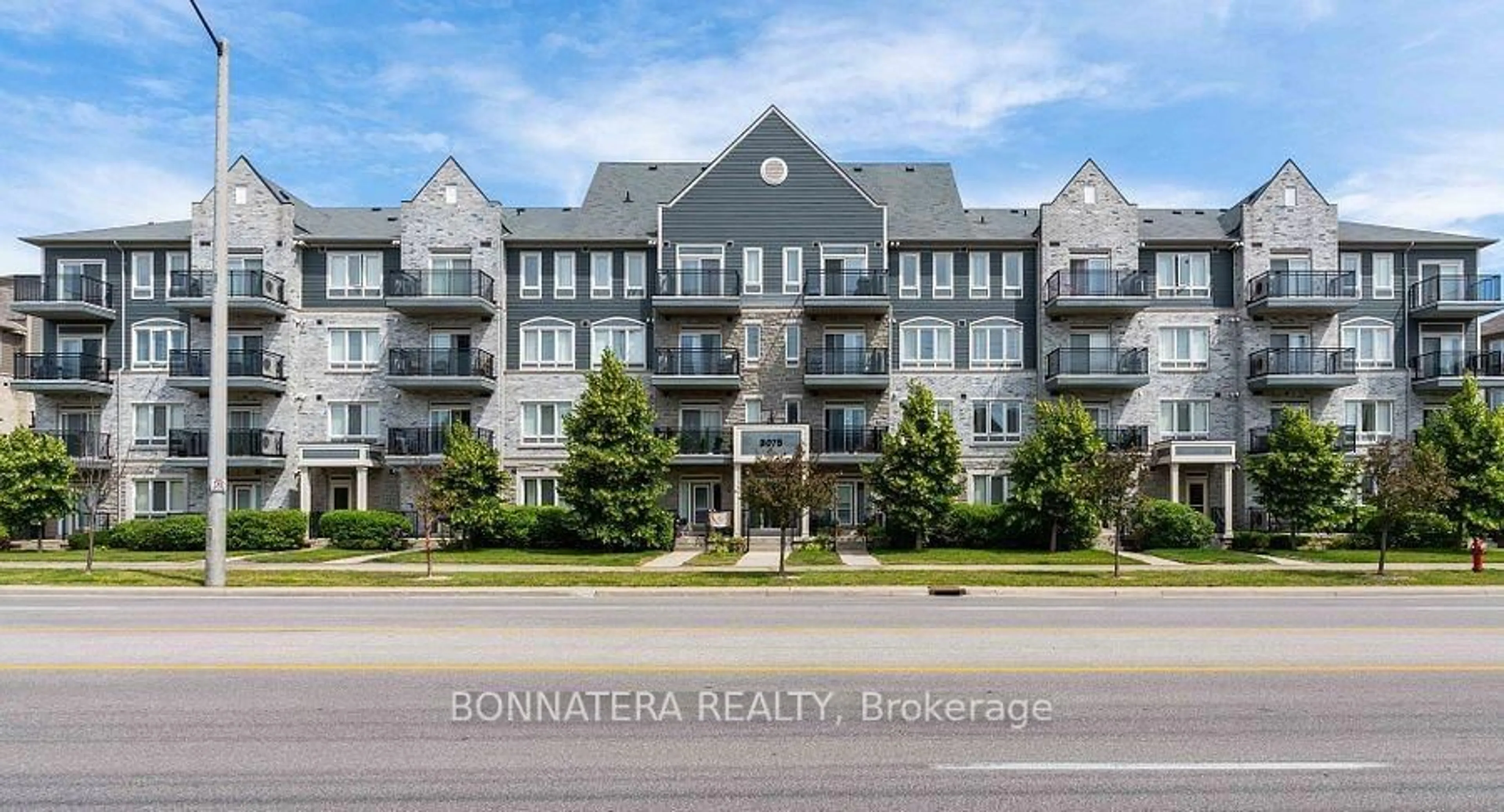 A pic from outside/outdoor area/front of a property/back of a property/a pic from drone, unknown for 3075 Thomas St #407, Mississauga Ontario L5M 0M4