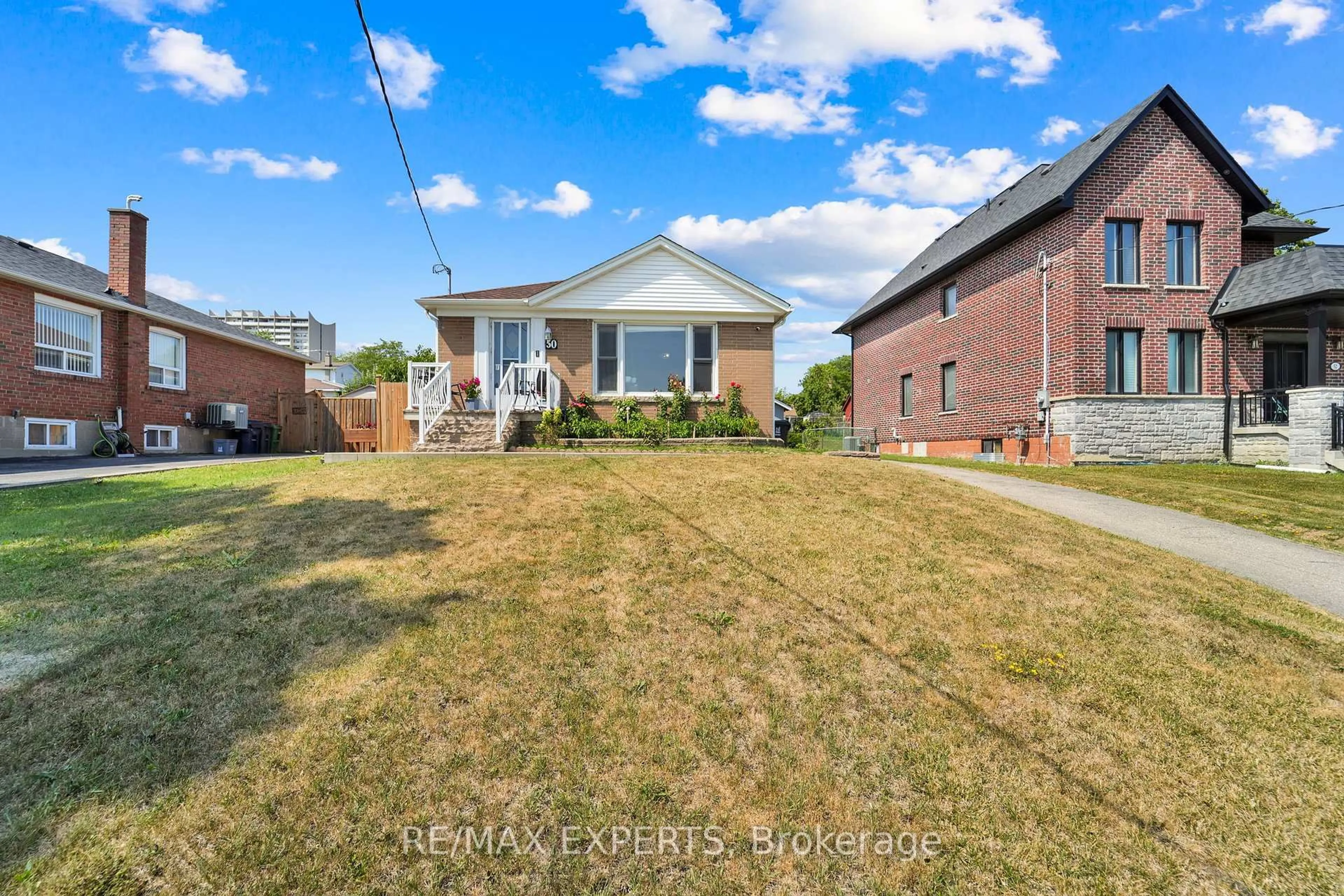 A pic from outside/outdoor area/front of a property/back of a property/a pic from drone, street for 50 Datchet Rd, Toronto Ontario M3M 1X6