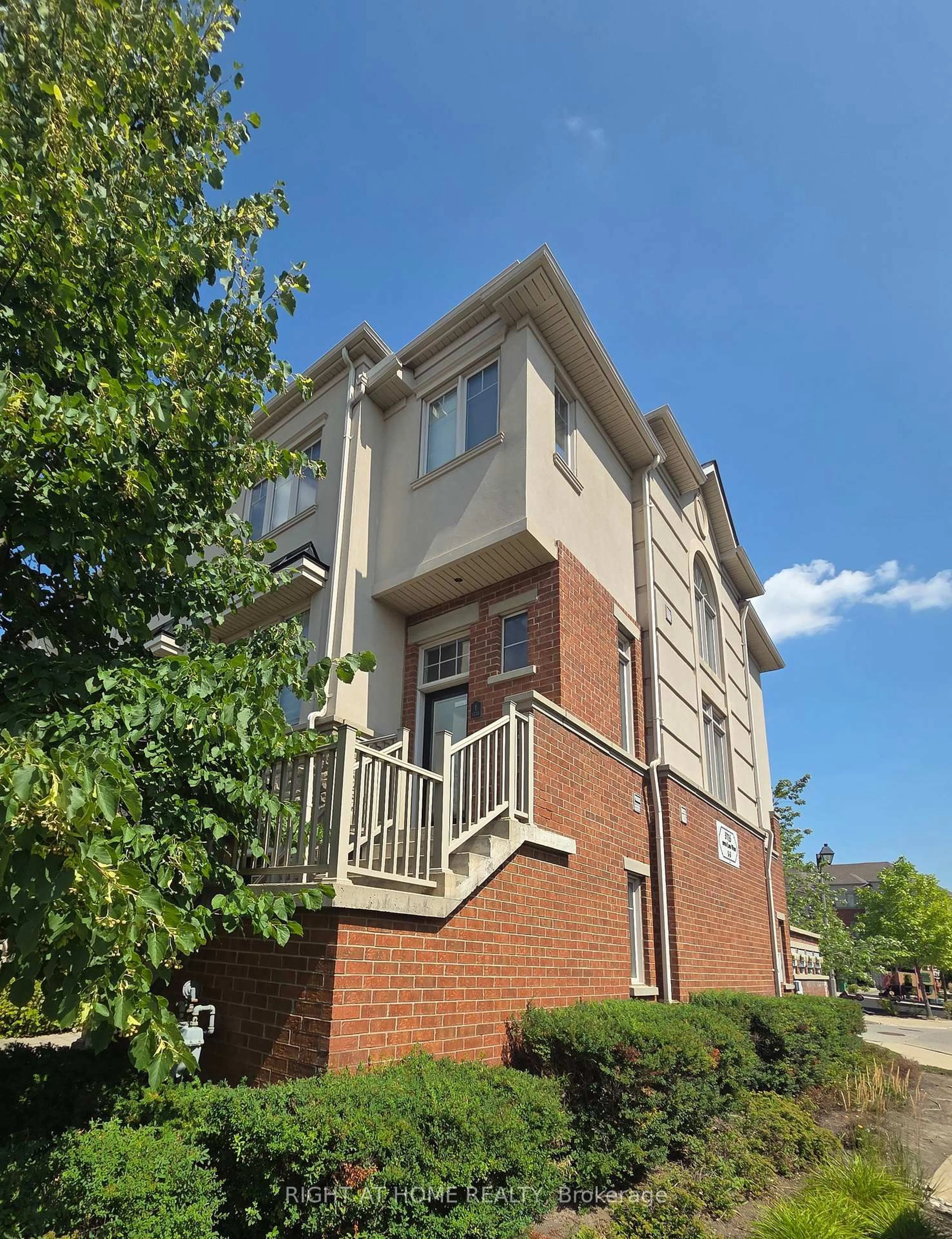 Home with brick exterior material, building for 5715 Tenth Line #1, Mississauga Ontario L5M 0R2