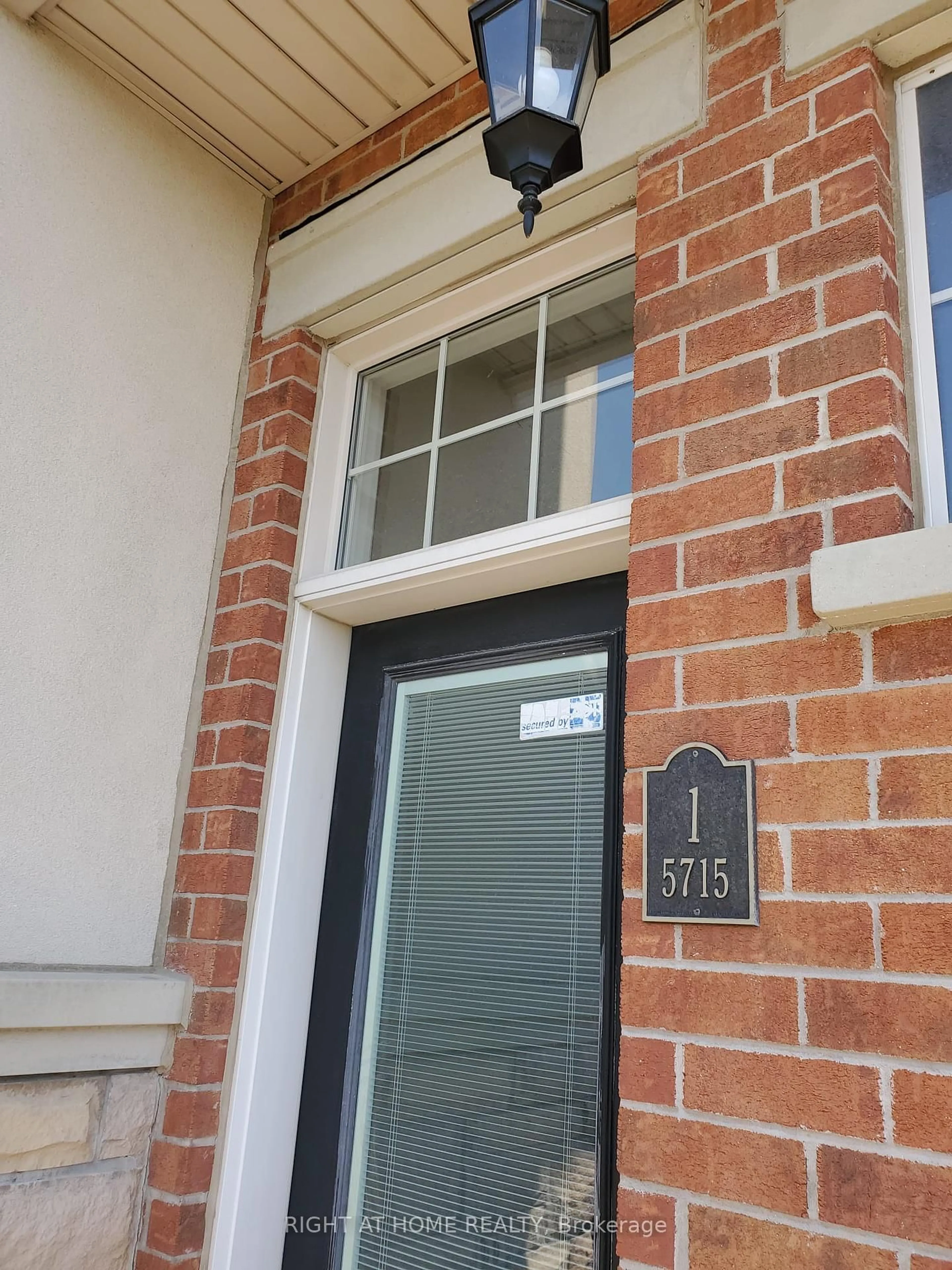 Home with brick exterior material, street for 5715 Tenth Line #1, Mississauga Ontario L5M 0R2