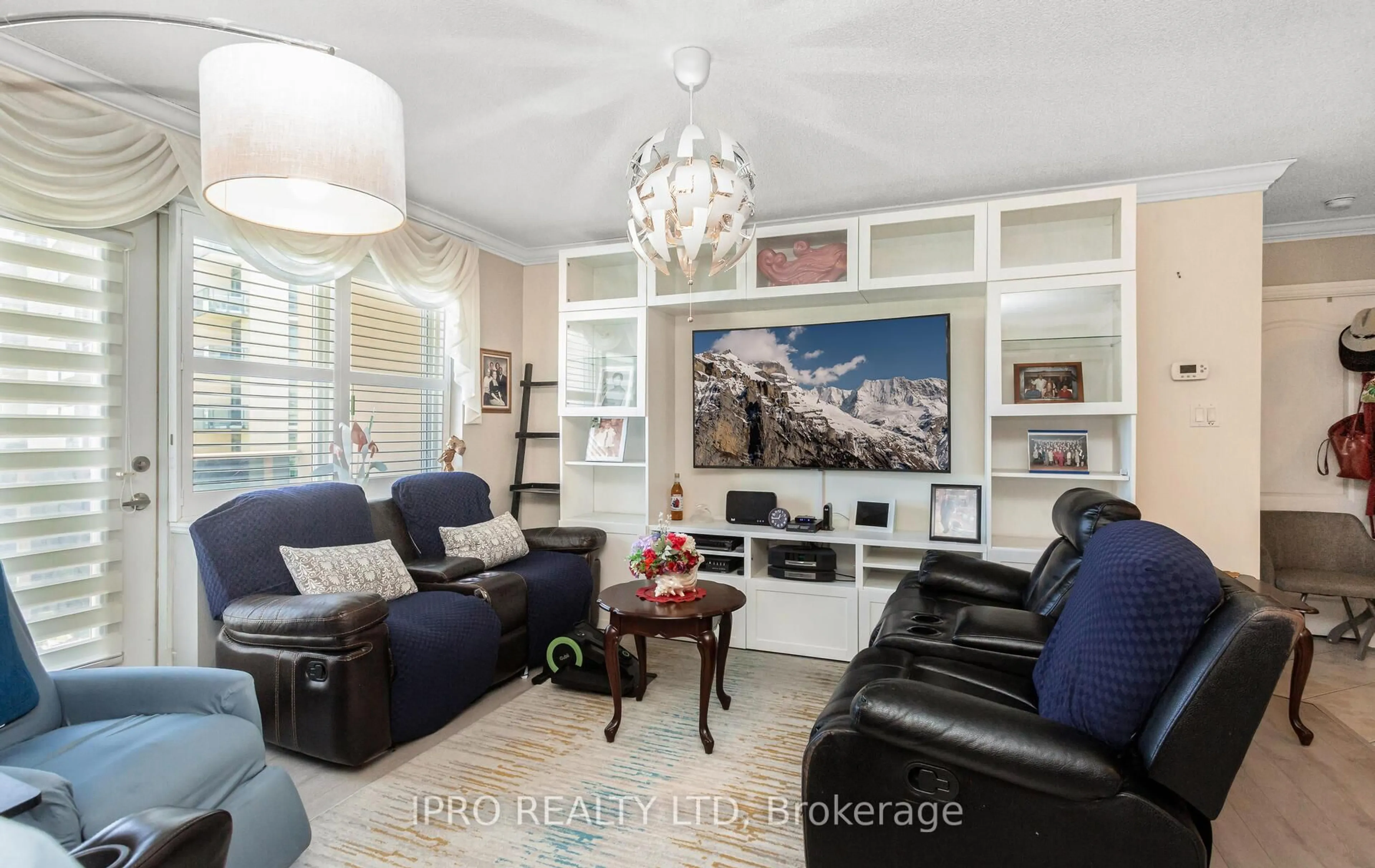 Living room with furniture, wood/laminate floor for 10 Dayspring Circ #606, Brampton Ontario L6P 1B9