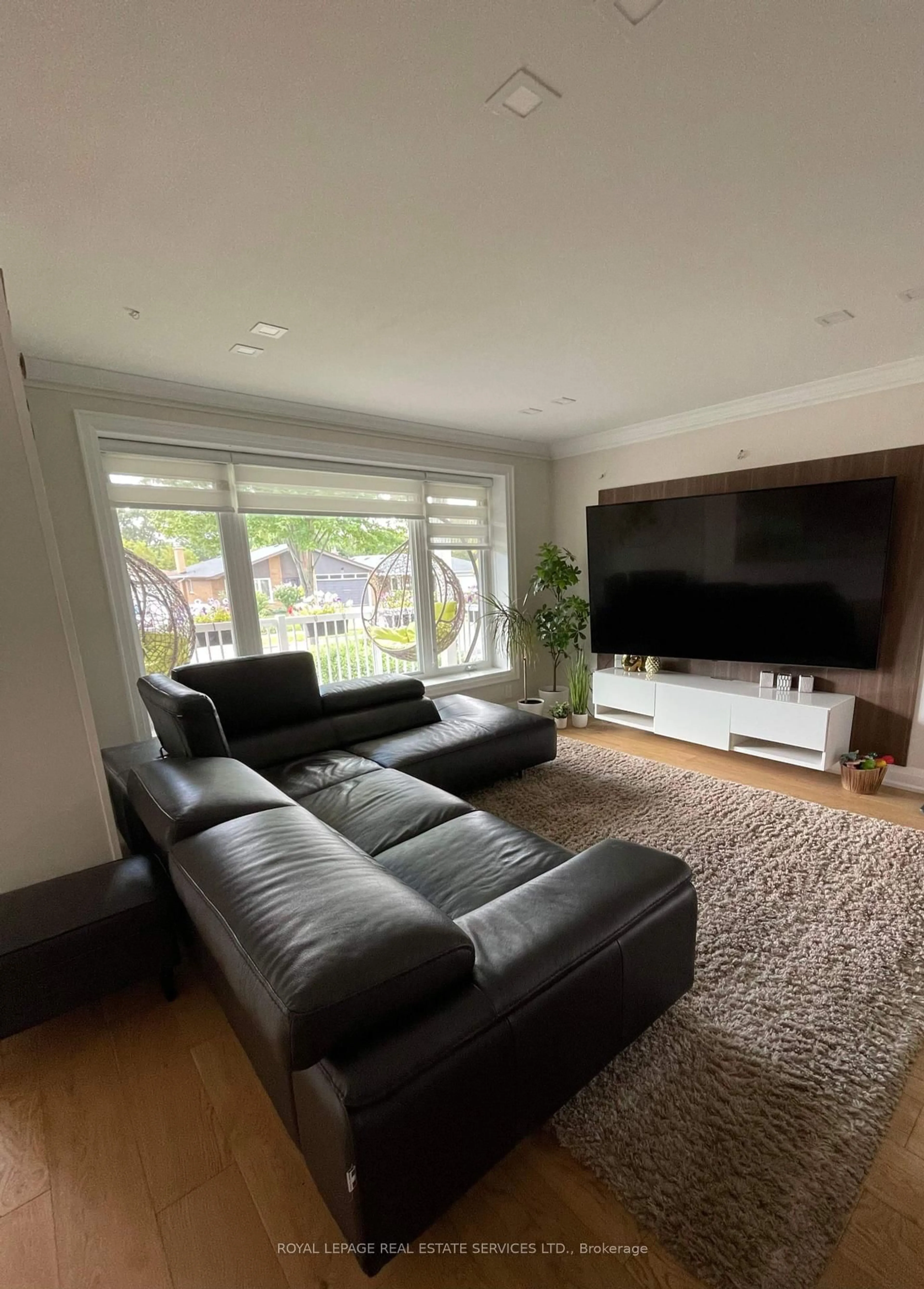 Living room with furniture, unknown for 12 Warlingham Crt, Toronto Ontario M9C 3K3