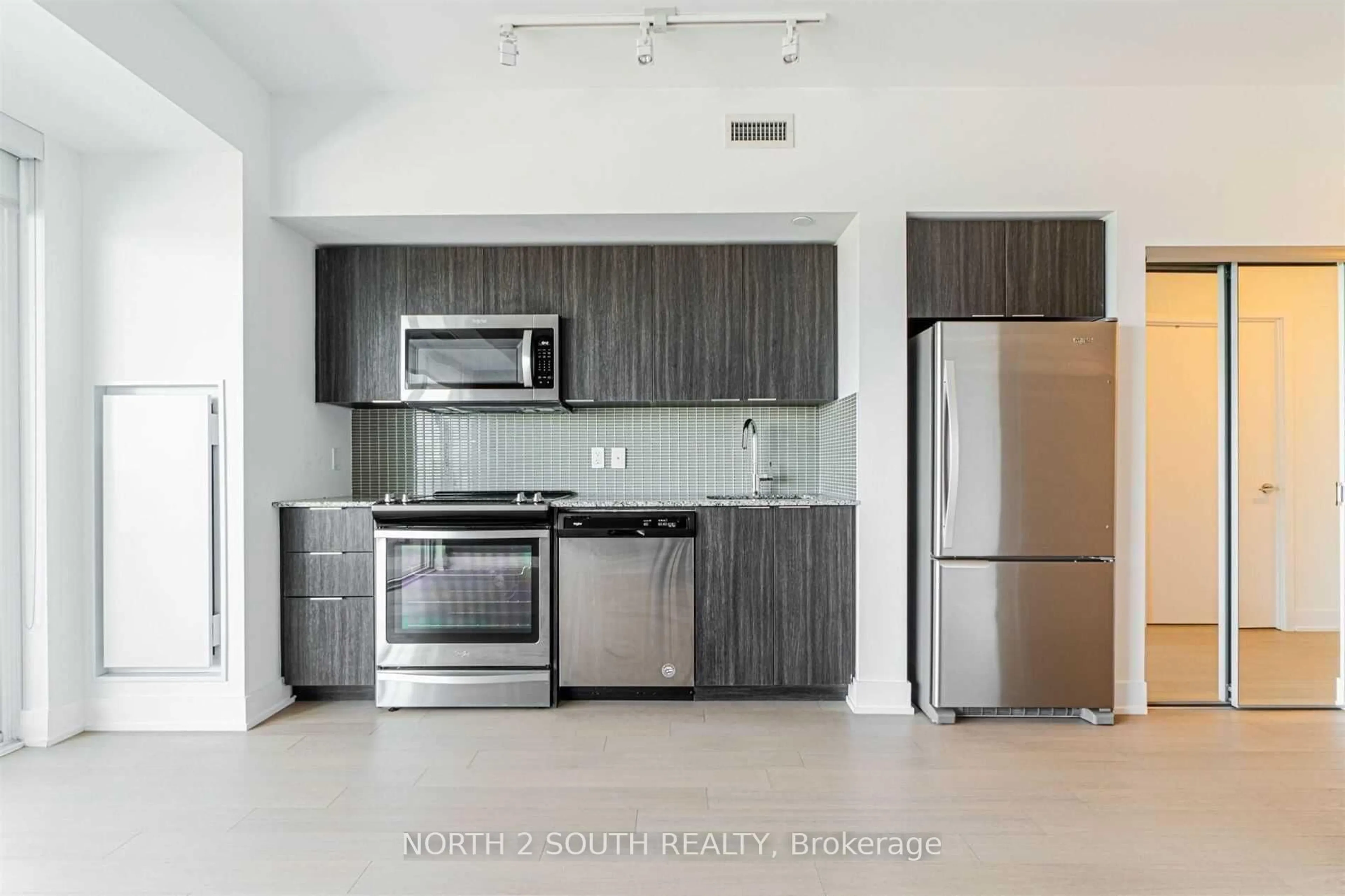 Standard kitchen, cement floor for 30 Shore Breeze Dr #4112, Toronto Ontario M8V 1A1