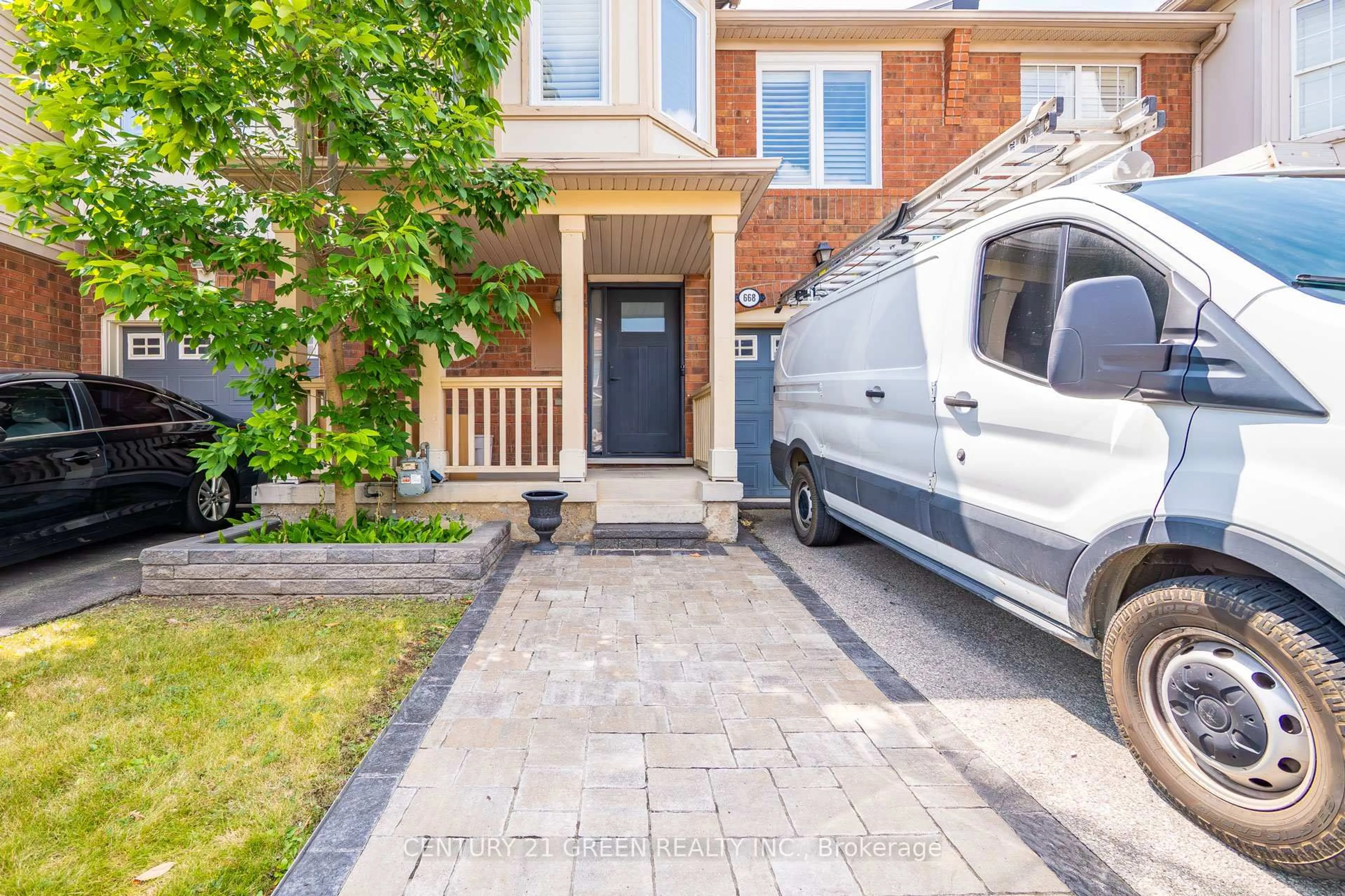 Home with brick exterior material, street for 668 Porter Way, Milton Ontario L9T 5W5