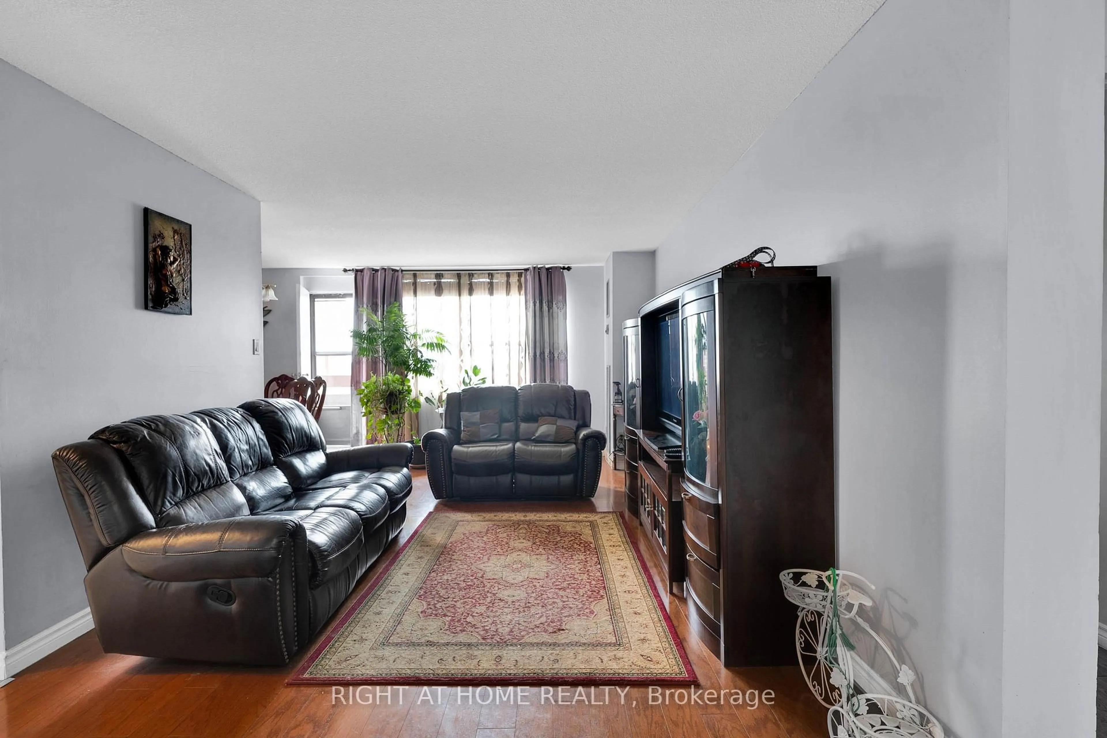Living room with furniture, unknown for 45 Silverstone Dr #909, Toronto Ontario M9V 4B1
