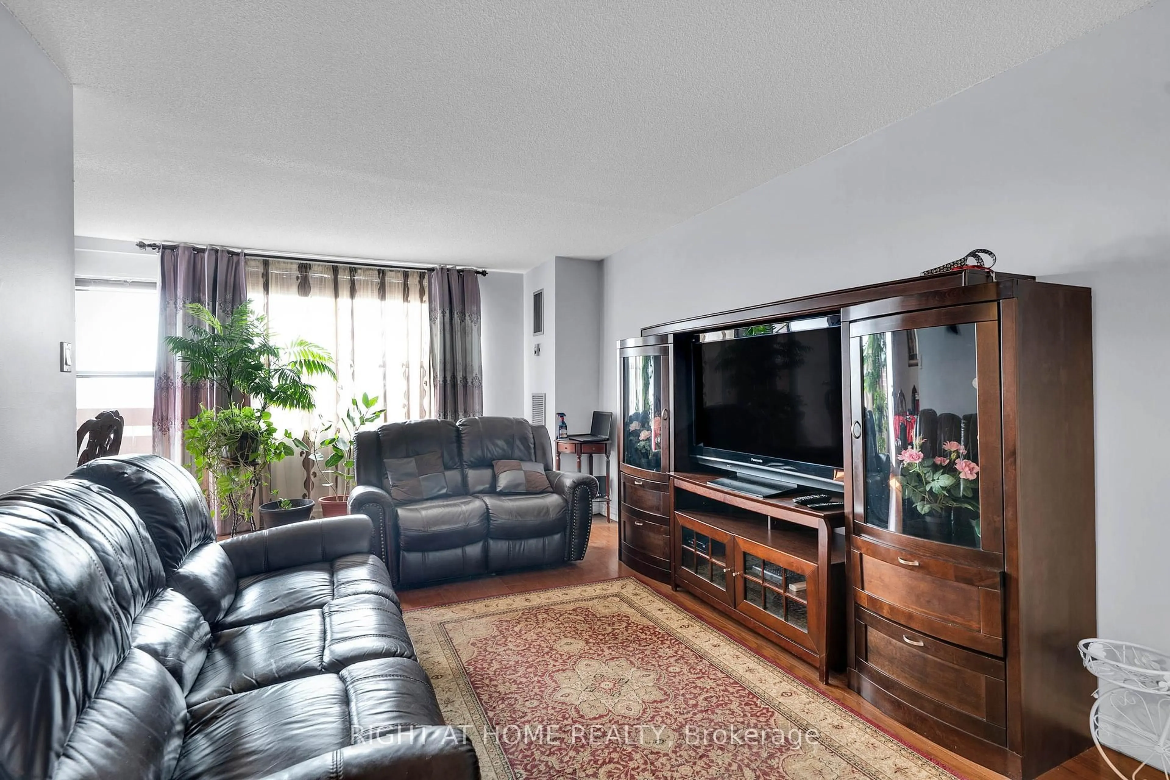 Living room with furniture, unknown for 45 Silverstone Dr #909, Toronto Ontario M9V 4B1