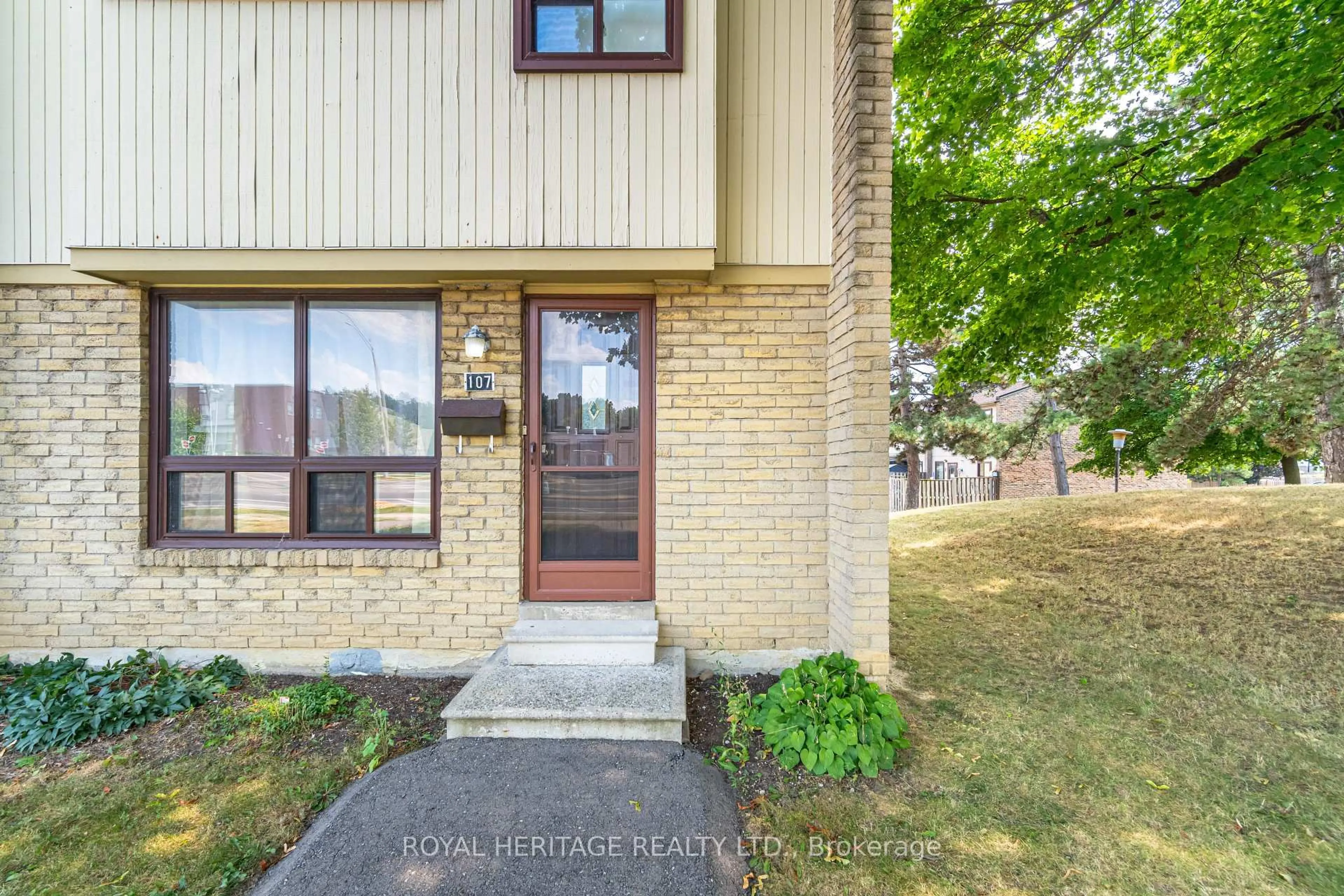 Home with brick exterior material, street for 107 Guildford Cres, Brampton Ontario L6S 3K2
