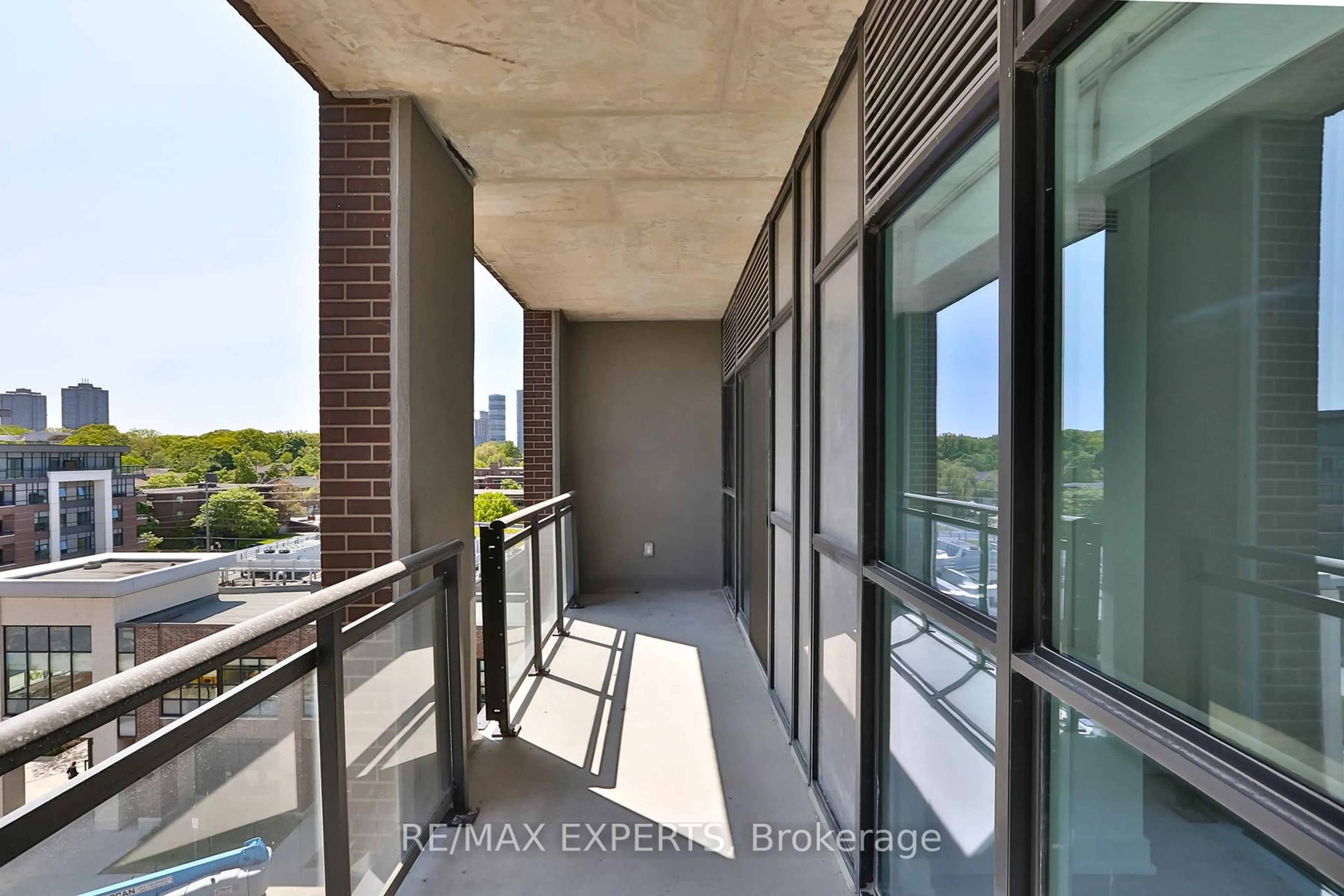 Balcony in the apartment, city buildings view from balcony for 25 Neighbourhood Lane #603, Toronto Ontario M8Y 0C4