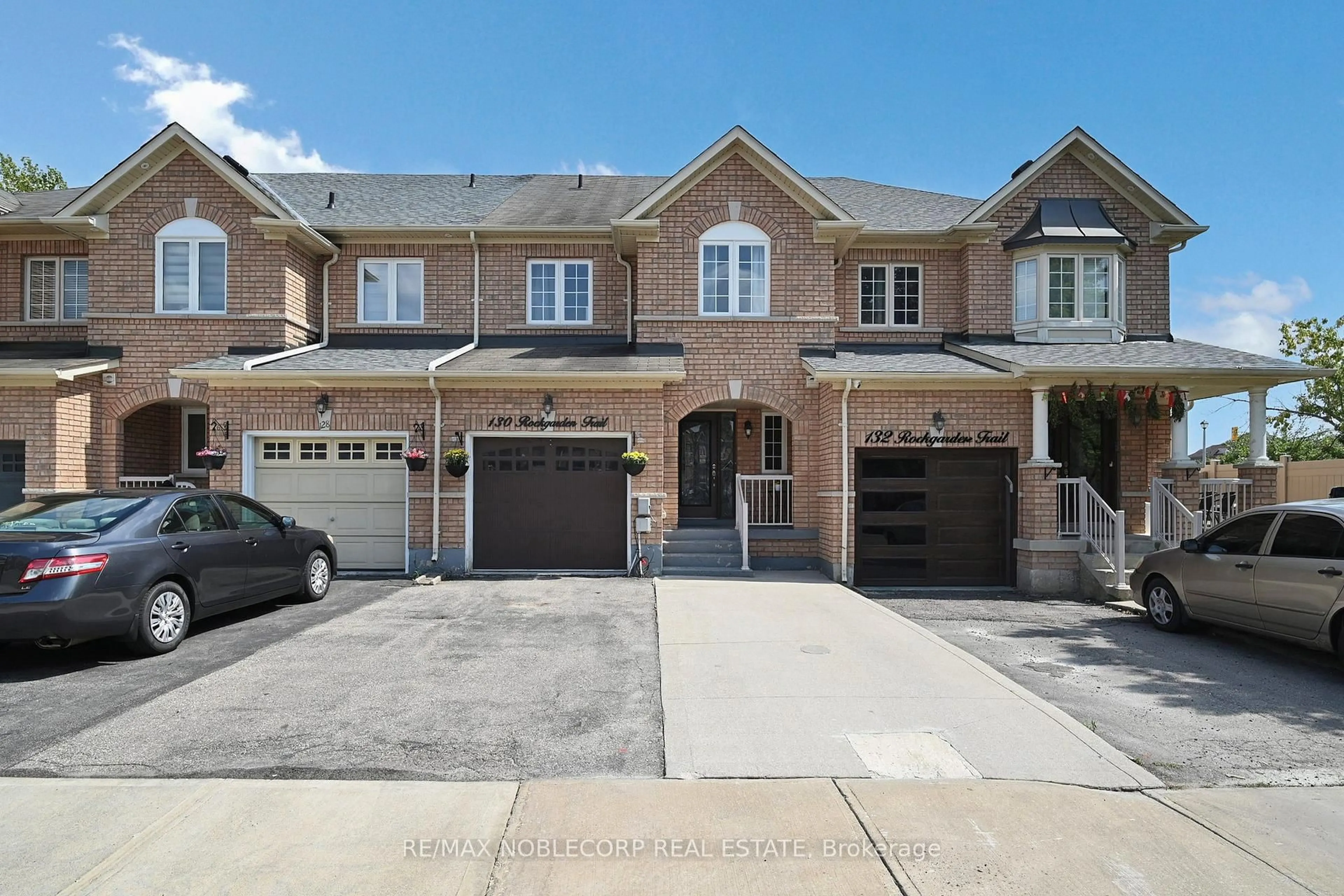 Home with brick exterior material, street for 130 Rockgarden Tr #145, Brampton Ontario L6R 3N2